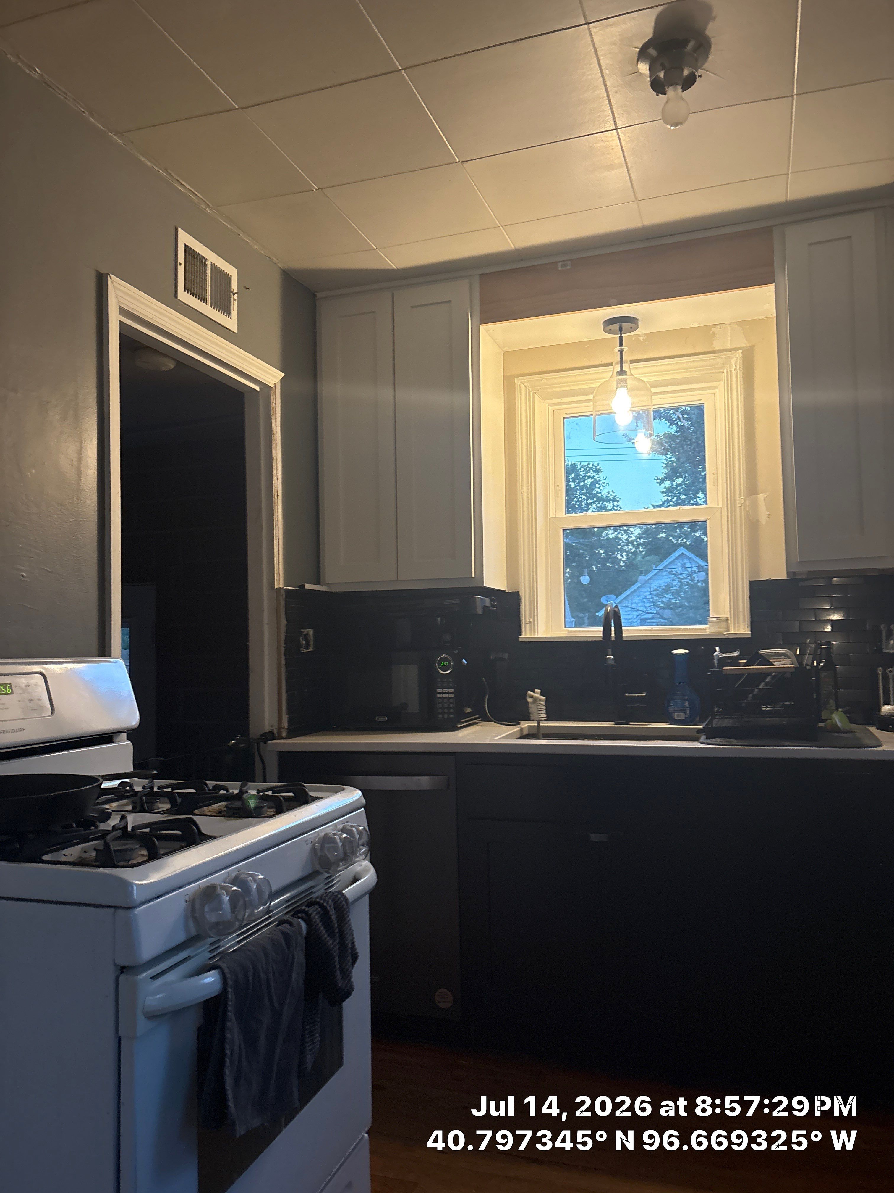 Two-Tone Kitchen Remodel with Quartz Countertops in Lincoln by CompanyCam Sales Demo