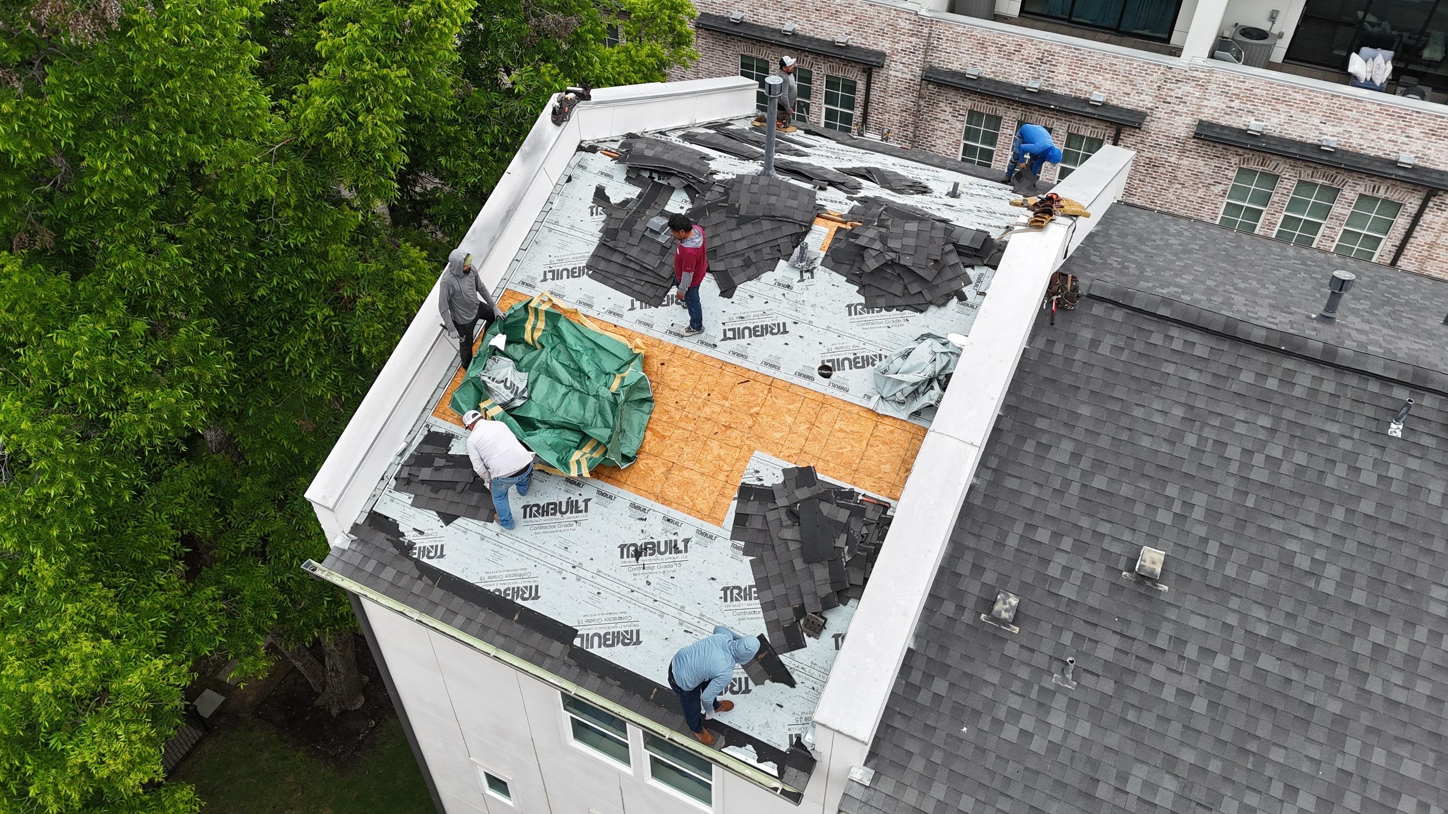 Residential Roof Replacement using TAMKO -  Stormfighter IR - Rustic Black by Action Exteriors Austin