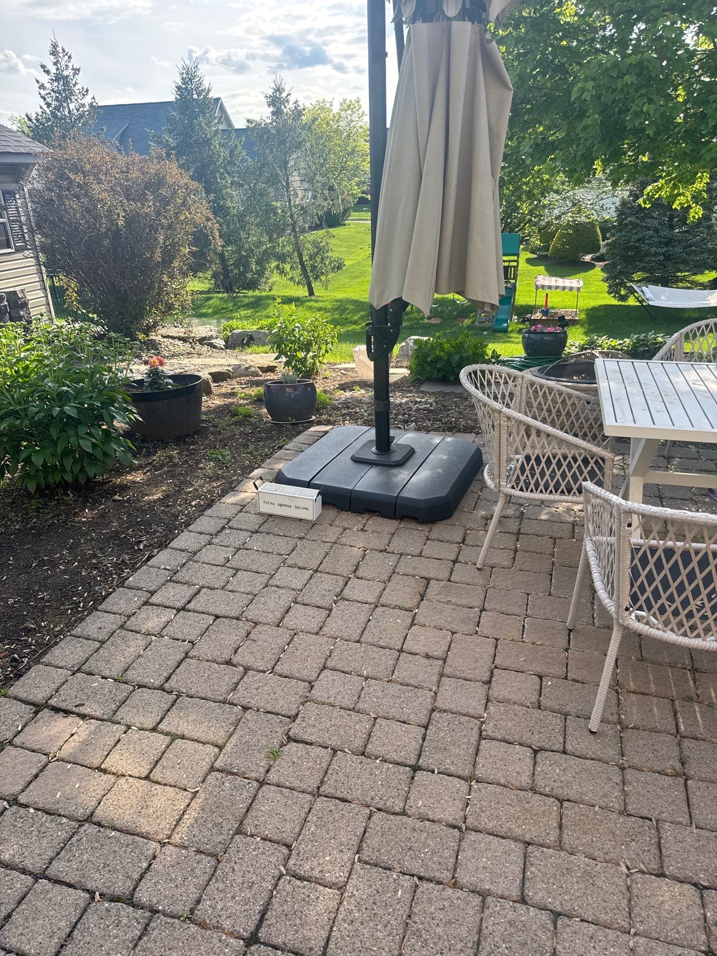 Backyard Retreat: Techo-Bloc Patio + Firepit Lounge by Saylor’s Lawn & Landscape