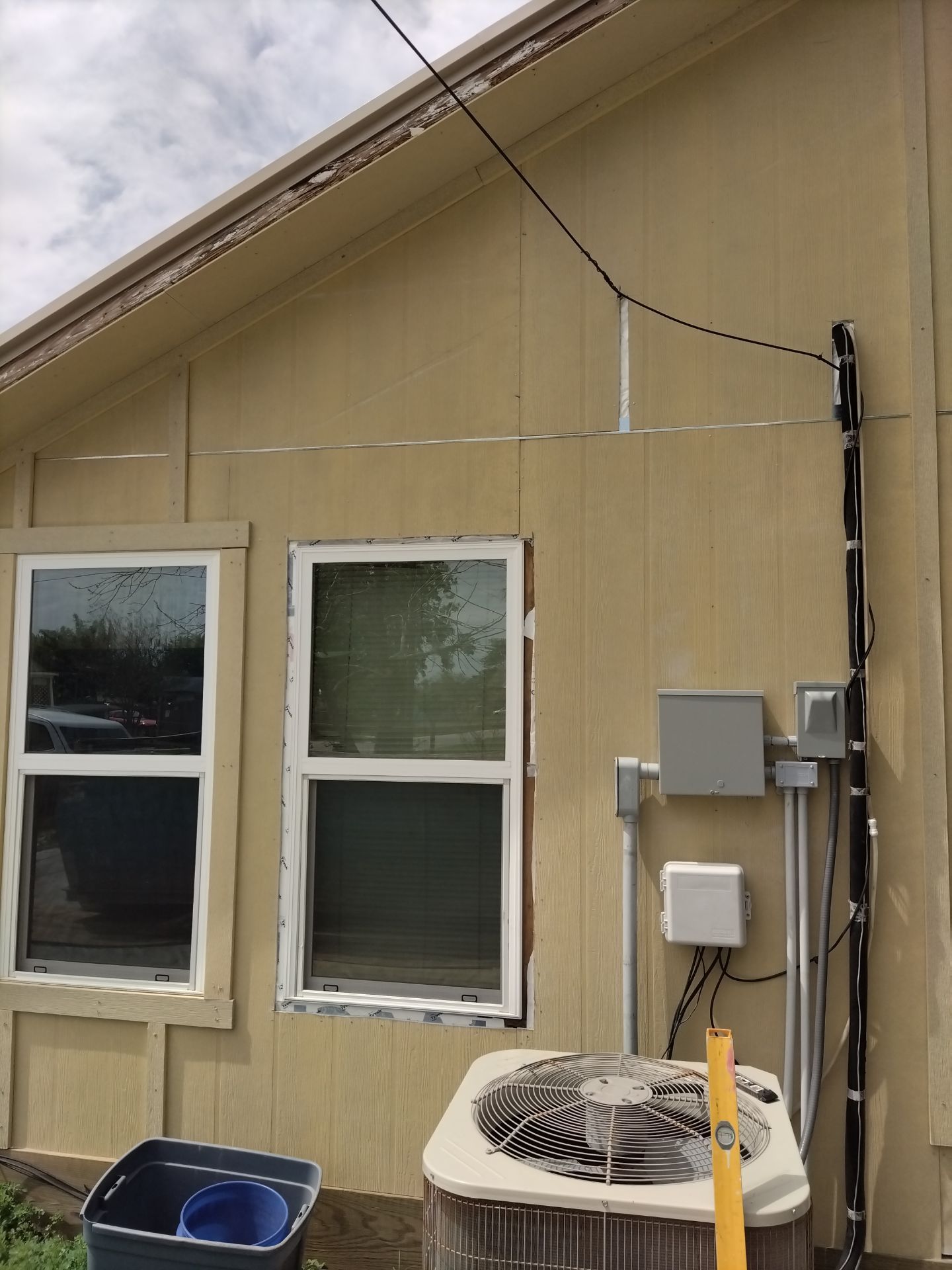 Vinyl to Hardie by Bayfront Roofing and Construction