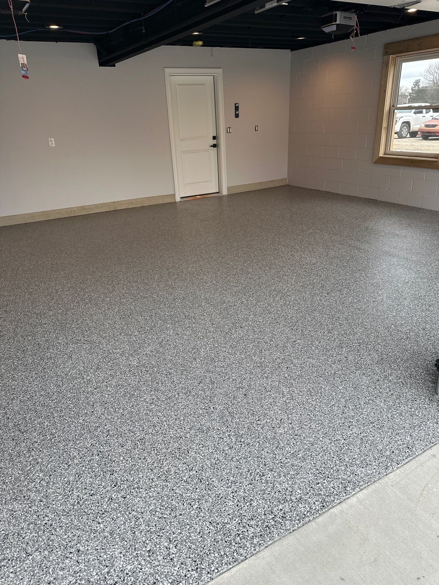 Garage Floor Coating using Wombat by My Garage Floor Guys