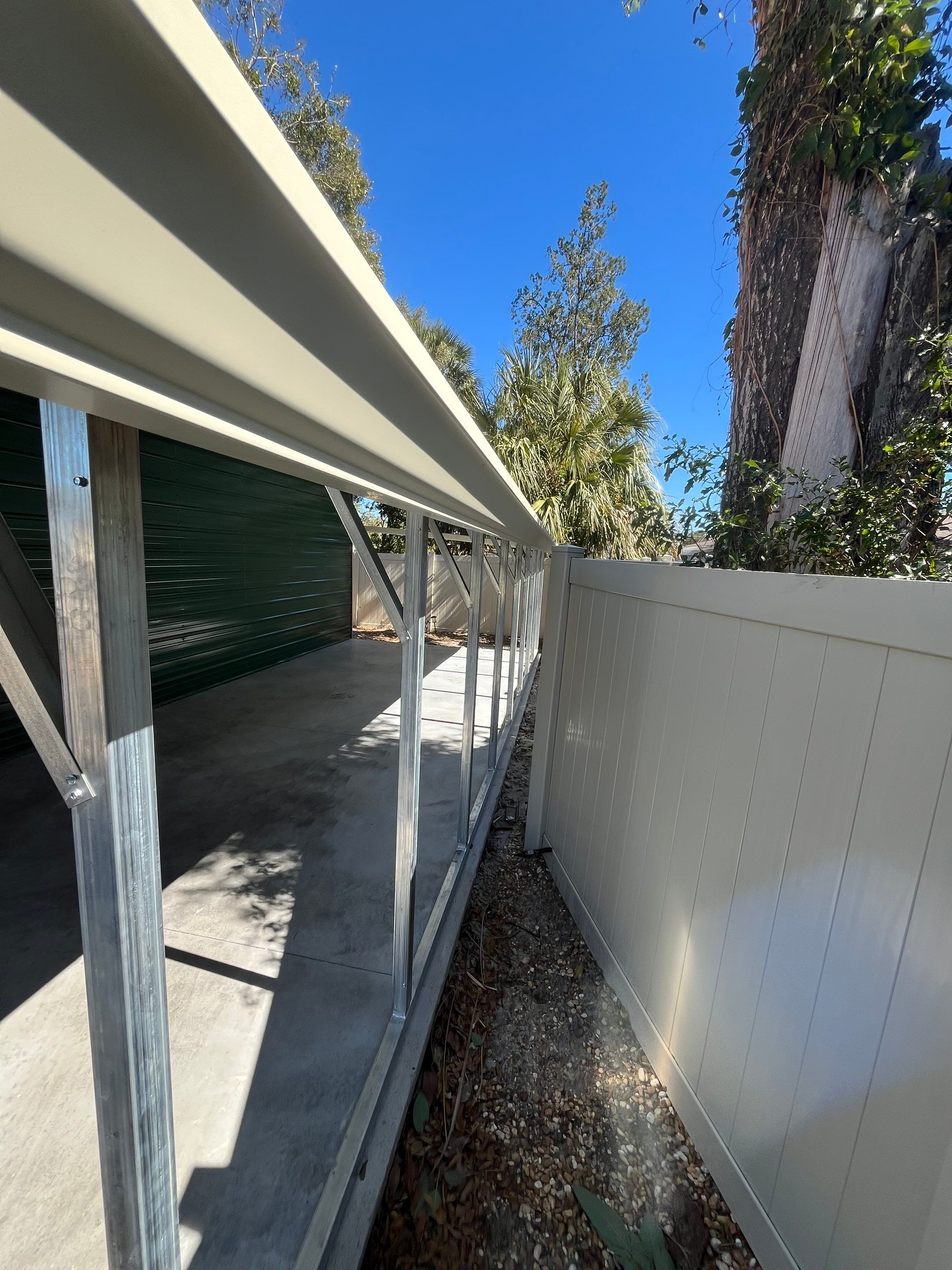 White 6-inch K-style Gutters and Down Spouts using Seamless Gutters White Down Spouts in Tampa FL by Gutter Professors