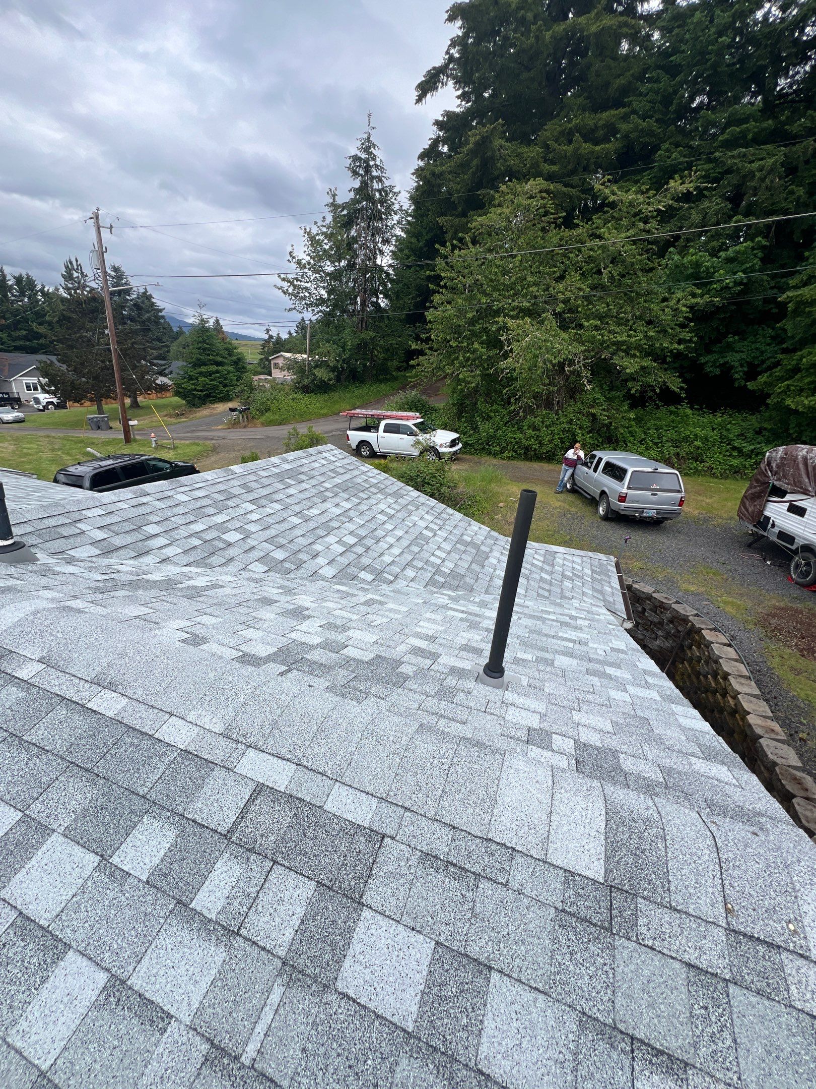 Residential Roofing Installation using IKO Dynasty (Color: Frostone Grey) by Orezona Building & Roofing Company, Inc.