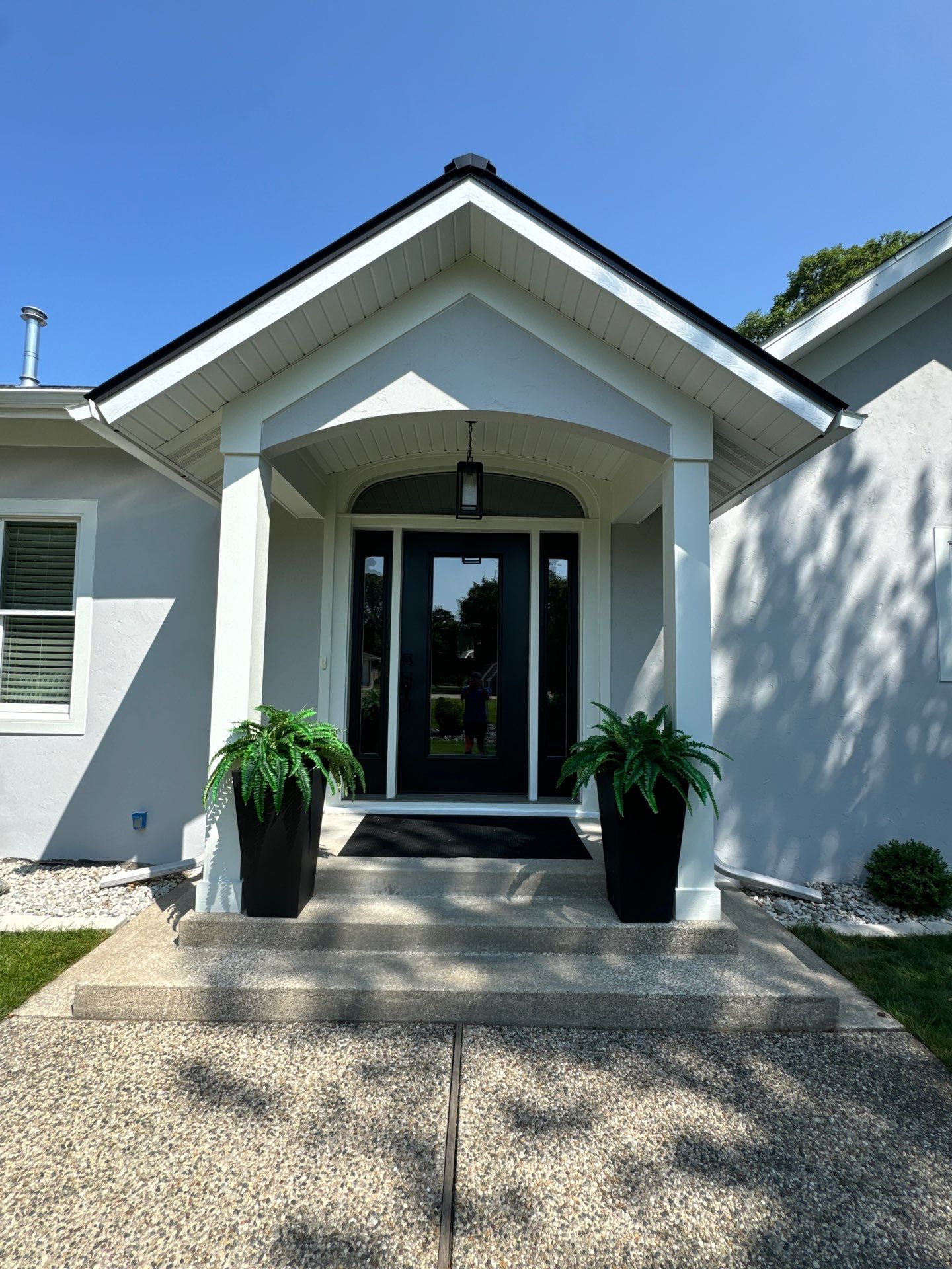 Norton Shores Residential Stucco Repair and Exterior Painting Refresh by Gordon Painting