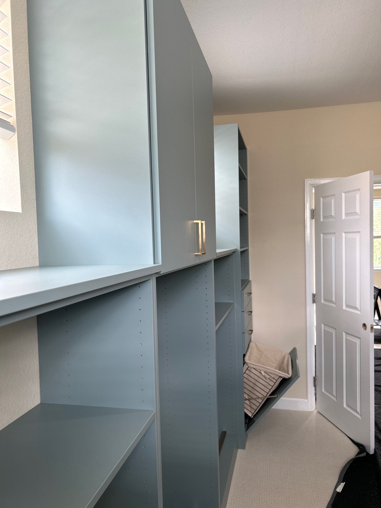 Multiple Closet Installations in Longmont by Concept 32, Inc.