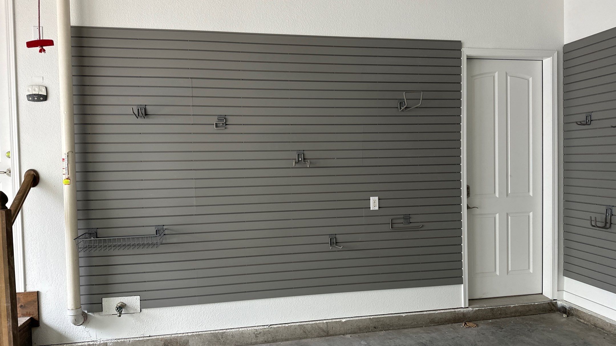 Brooke L. added cabinets for a clean storage look by Banner Garage