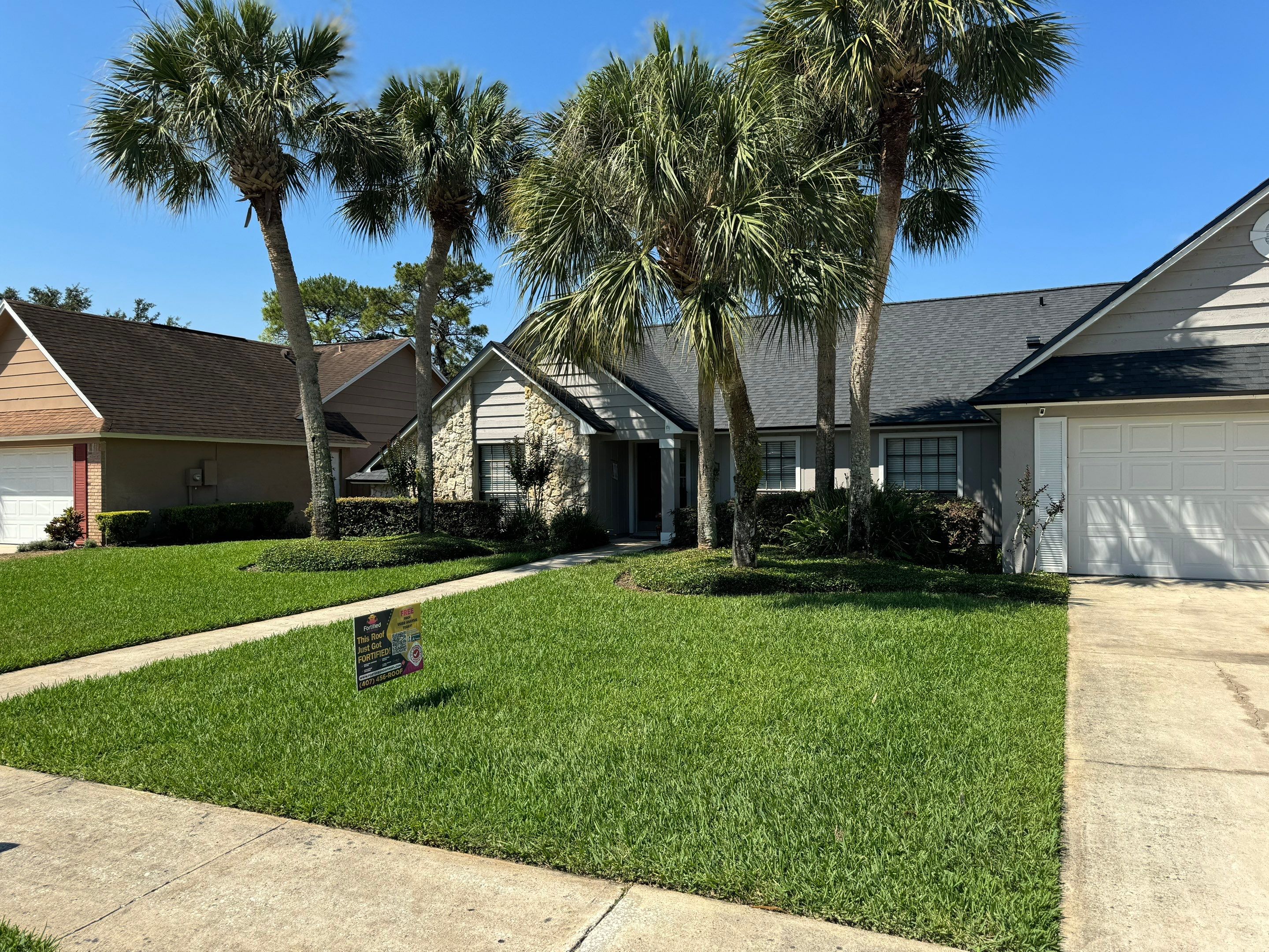 Asphalt Architectural Shingle Roof Replacement and Solar Integration in Longwood by Fortified Roofing Solutions Corp.