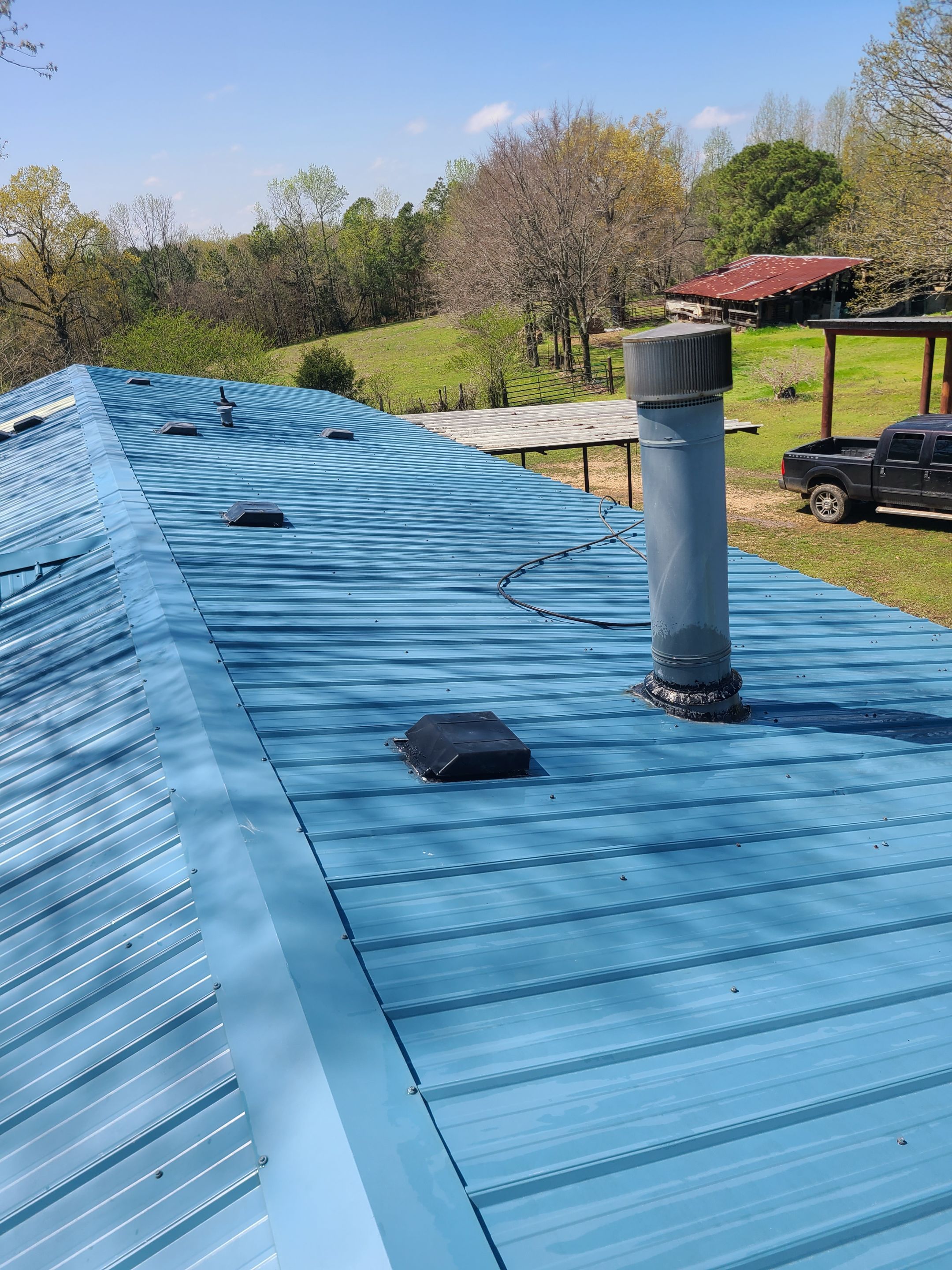 Commercial Roofing Installation using Aldocoat Coatings by Hostetler Roofing