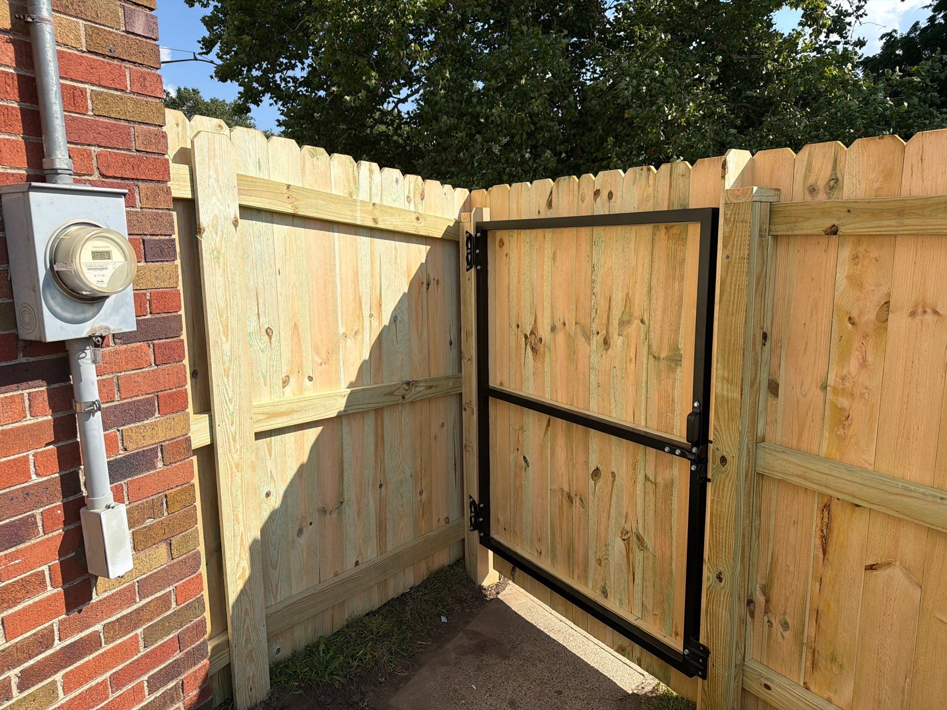 New Treated Wood Privacy Fence and Metal-Framed Gates by Perfect Picket Fence and Stain