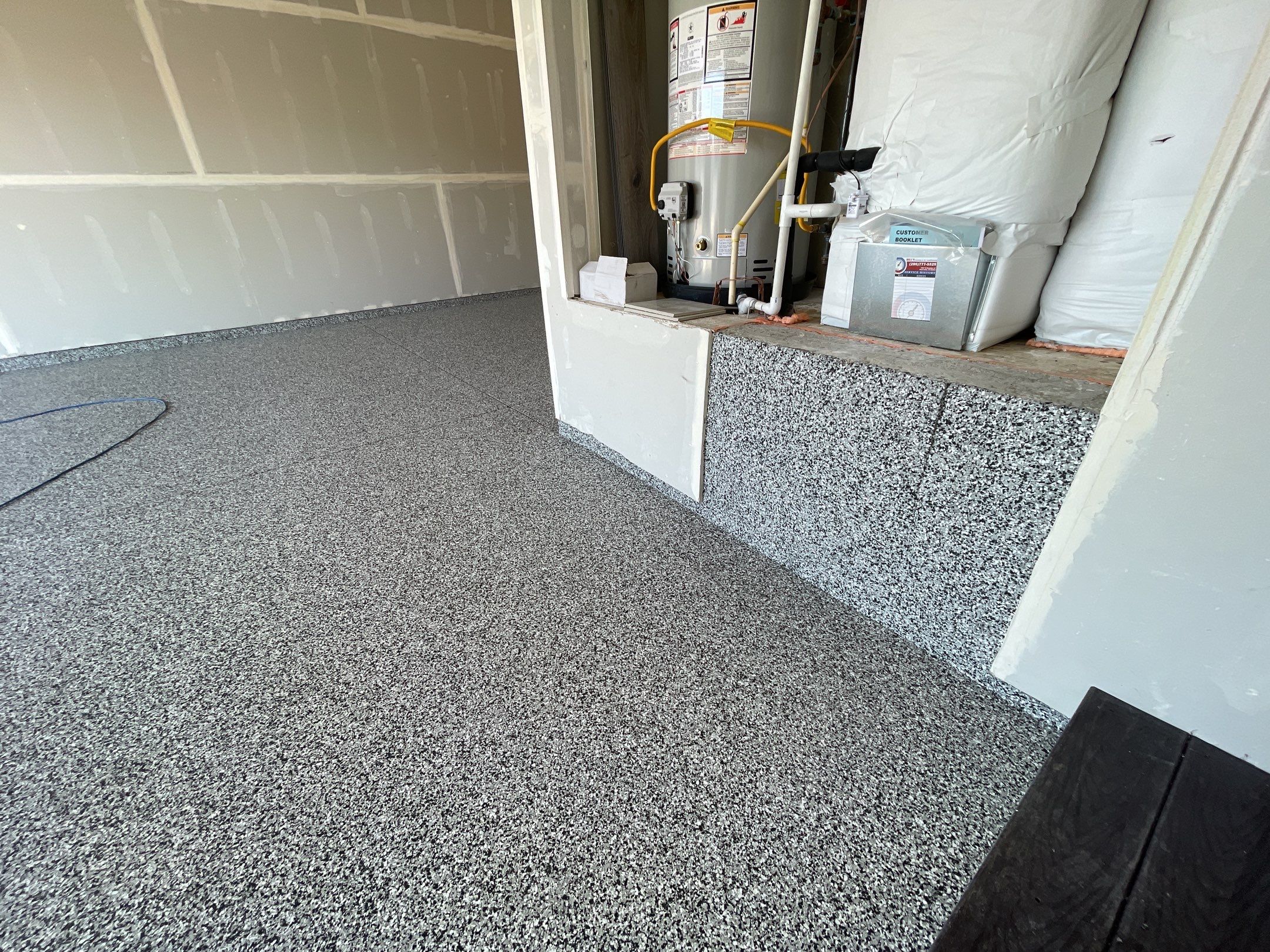Garage Transformation using Domino by Croc Coatings, LLC