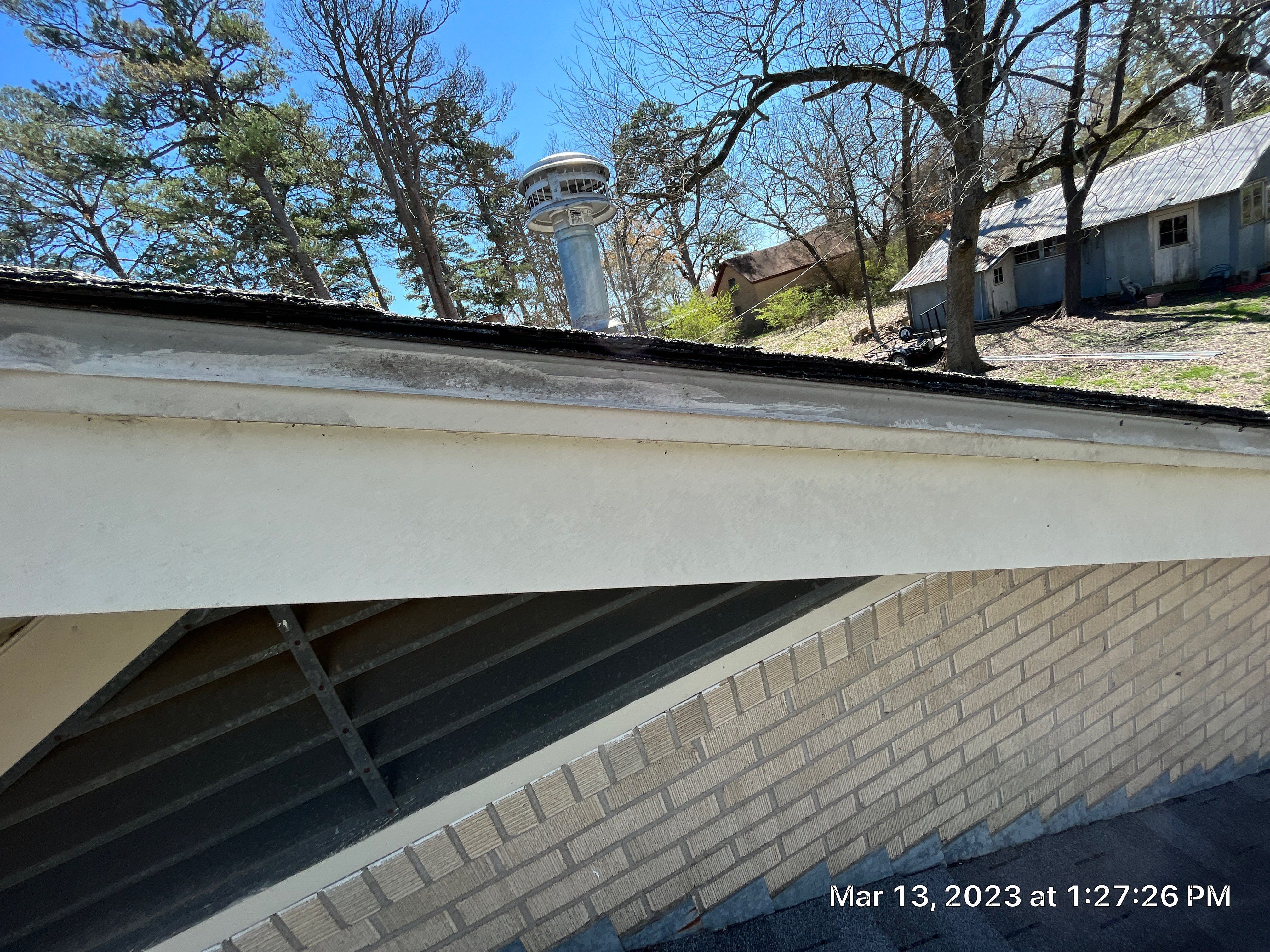 Residential Roofing Installation using 26 Gauge Colored Panels by Hostetler Roofing