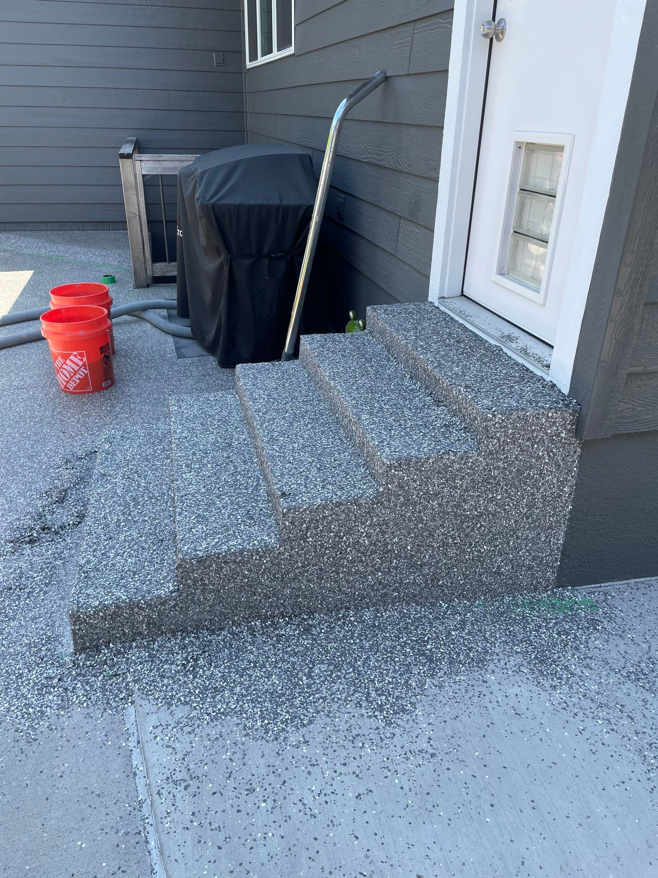Silver Creek Flak Coating for Patio and Entry Steps in Sioux Falls by Select Painting, Coatings & Garage Cabinets