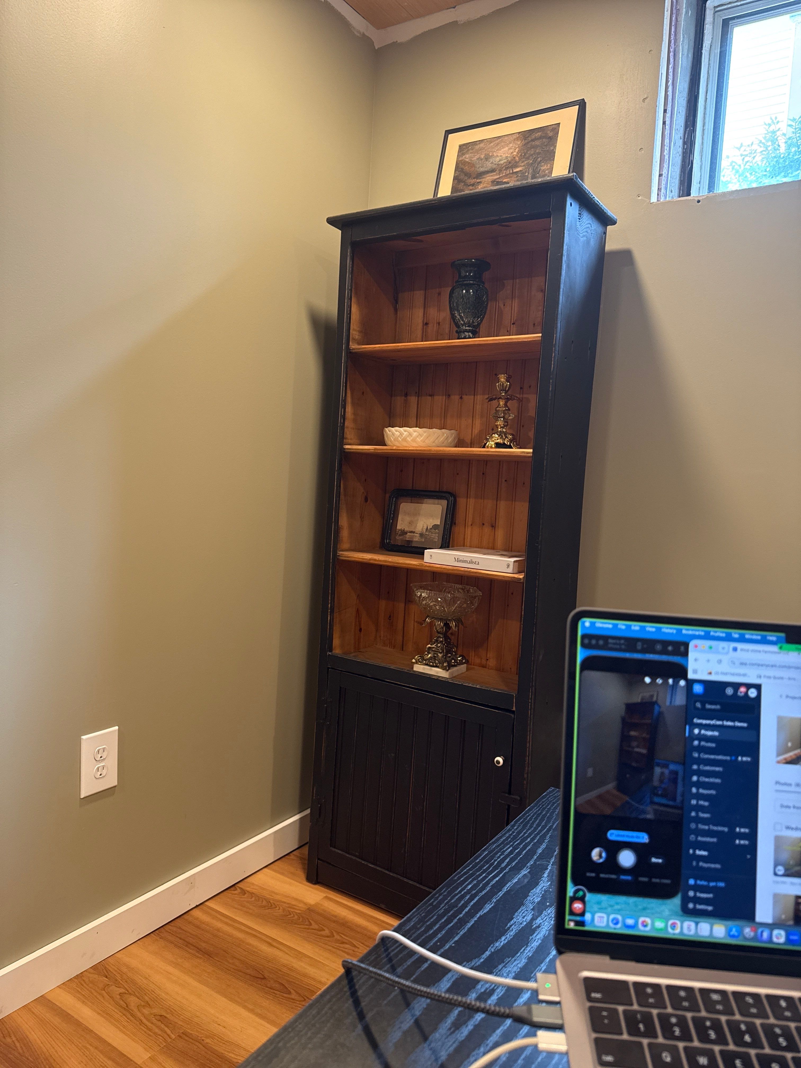 Lincoln Basement Office Renovation with Sage Green Walls and Laminate Flooring by CompanyCam Sales Demo