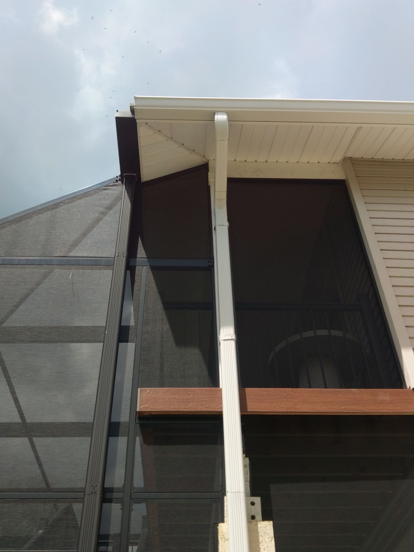 Complete Gutter System with Downspouts & Guards in Fort Myers Beach FL by Gutter Professors