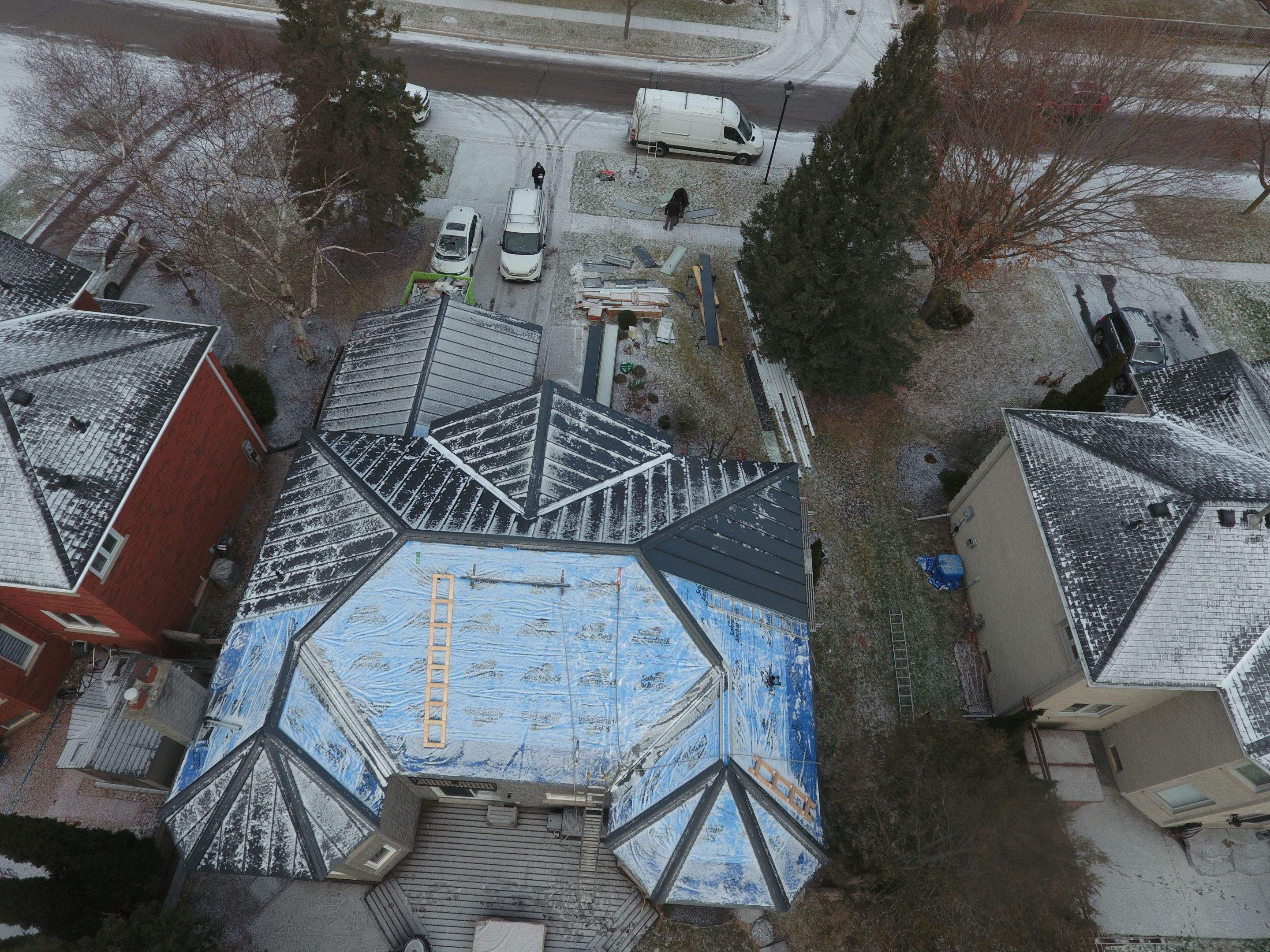 Roof Replacement using 16" Standing Seam Panels by Jay Carter Roofing & Sheet Metal