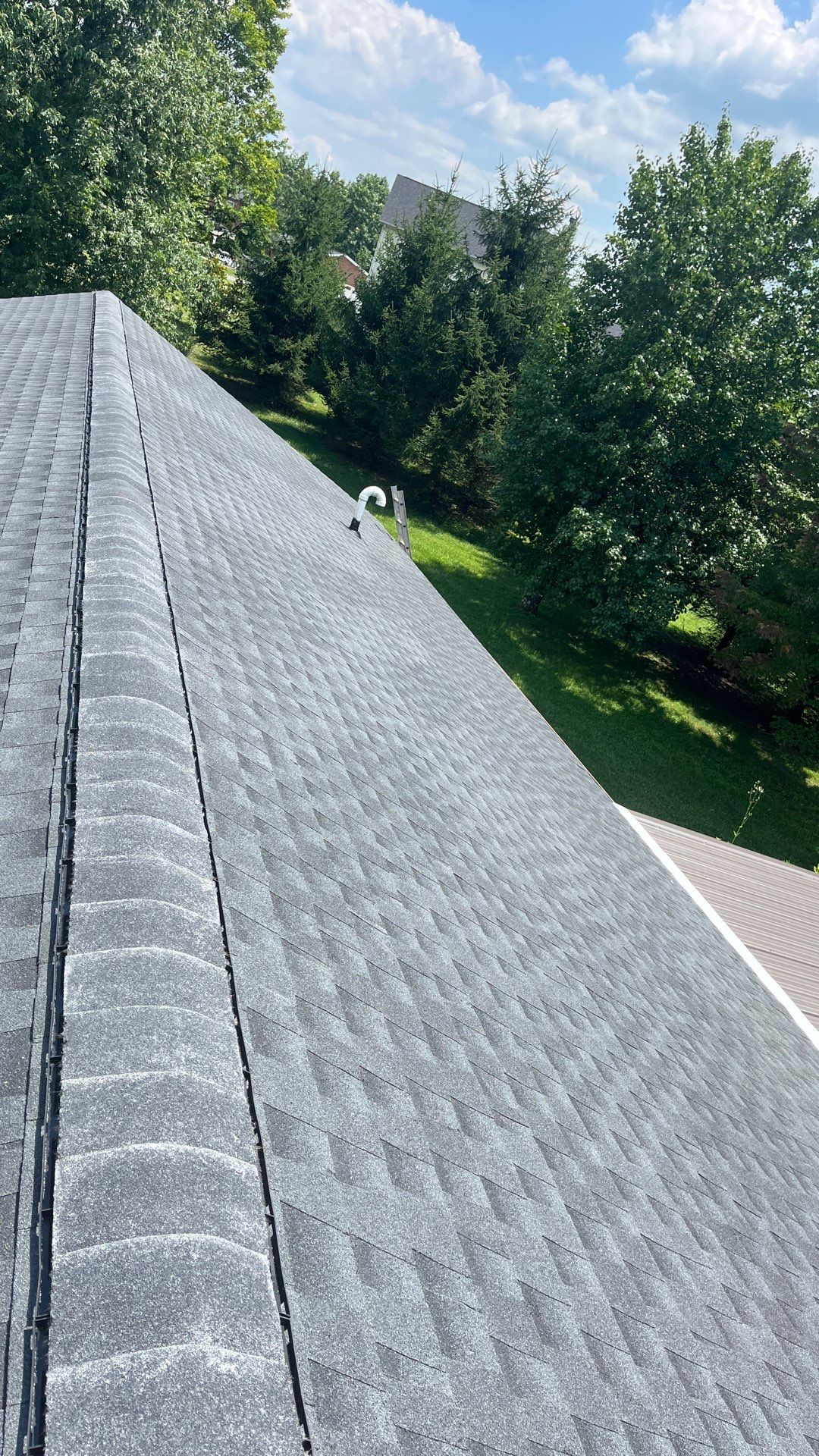 Residential Roofing Installation using GAF Timberline HDZ Charcoal by Rainstoppers Roofing