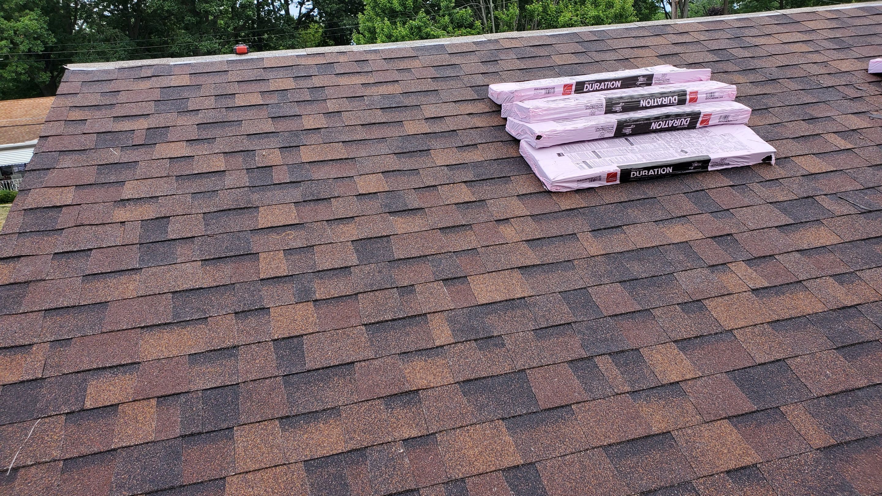 Residential Roofing Installation using Ownens Corning Duration Brownwood by Absolute Roofing and Construction