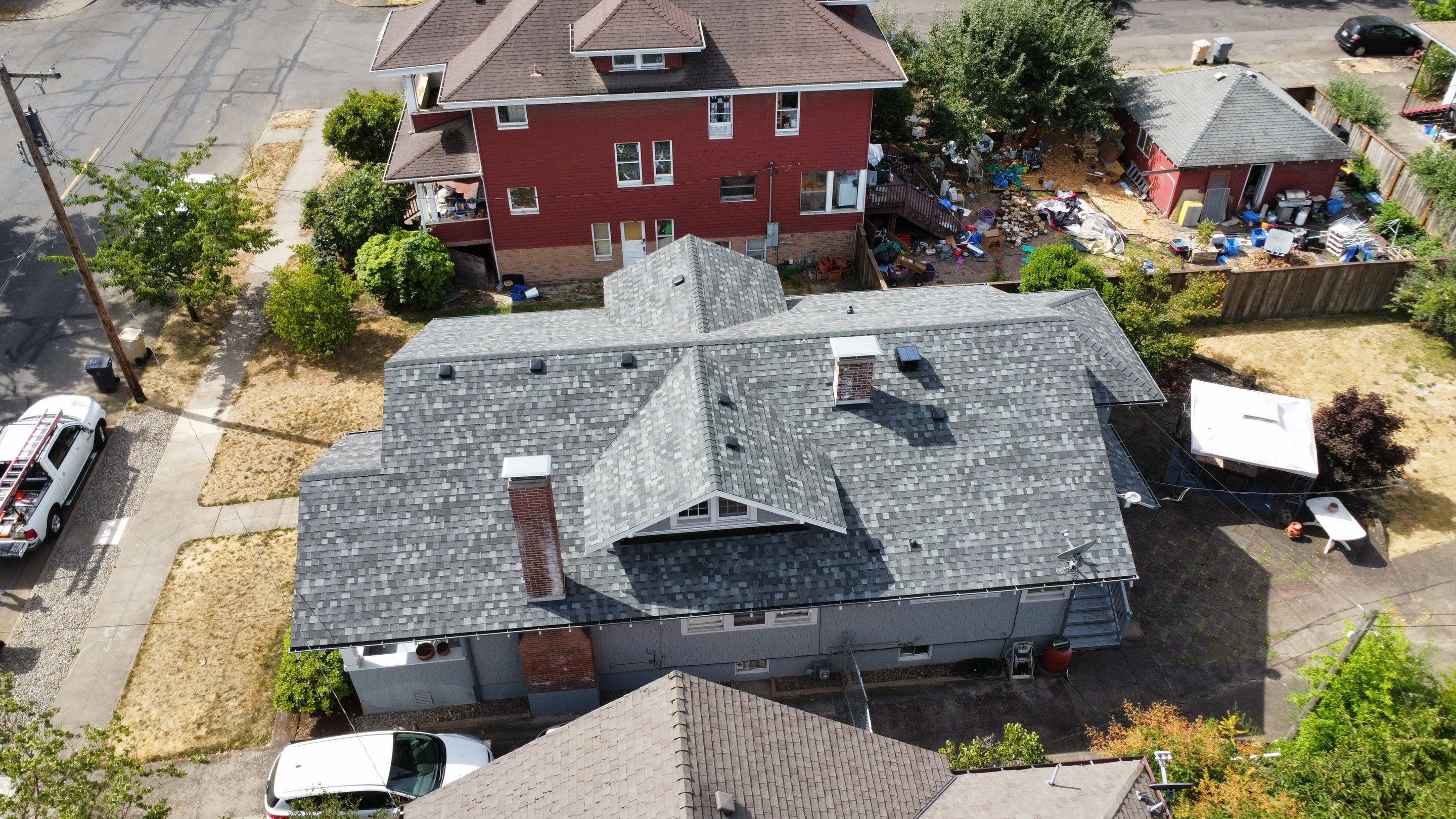 Residential Roofing Installation using IKO Dynasty (Color: Summit Grey) by Orezona Building & Roofing Company, Inc.
