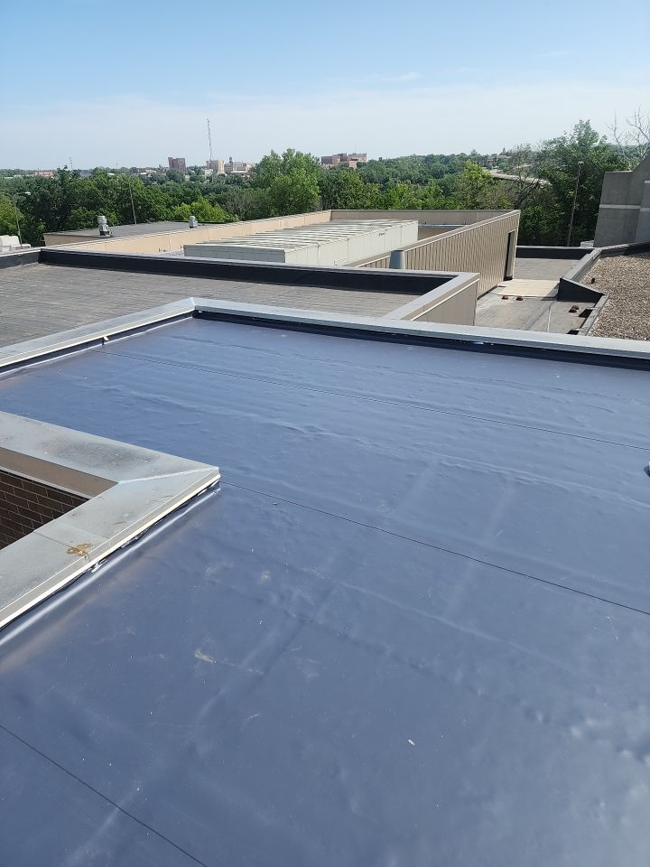 Commercial Roofing Installation using Charcoal DURO LAST by Grell Roofing, LLC