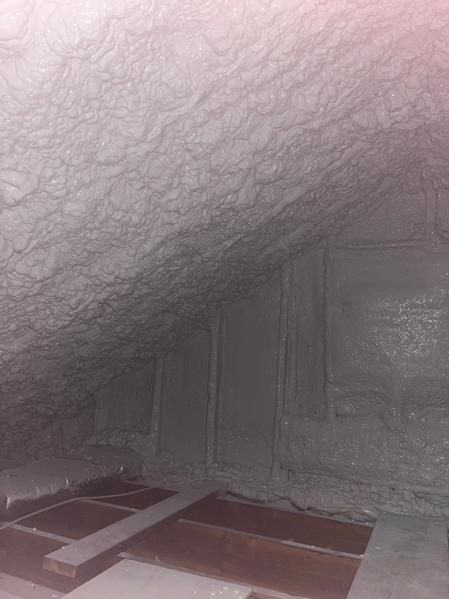 Attic Retrofit using open cell spray foam by NYS Foam & Energy