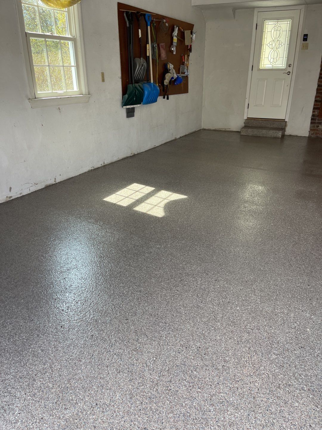Large Patio + Garage Project in Pittsburgh by Floors in a Day, Inc