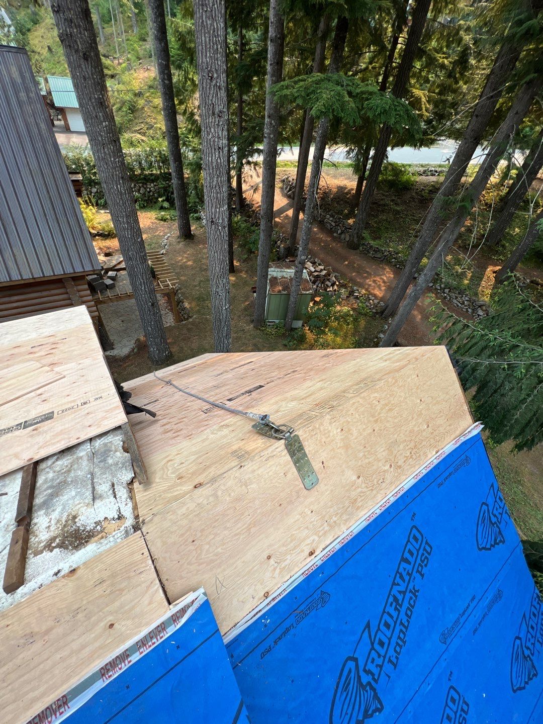 Residential ReRoofing Installation using 12" Prolok metal  by Top Notch Roofing Inc