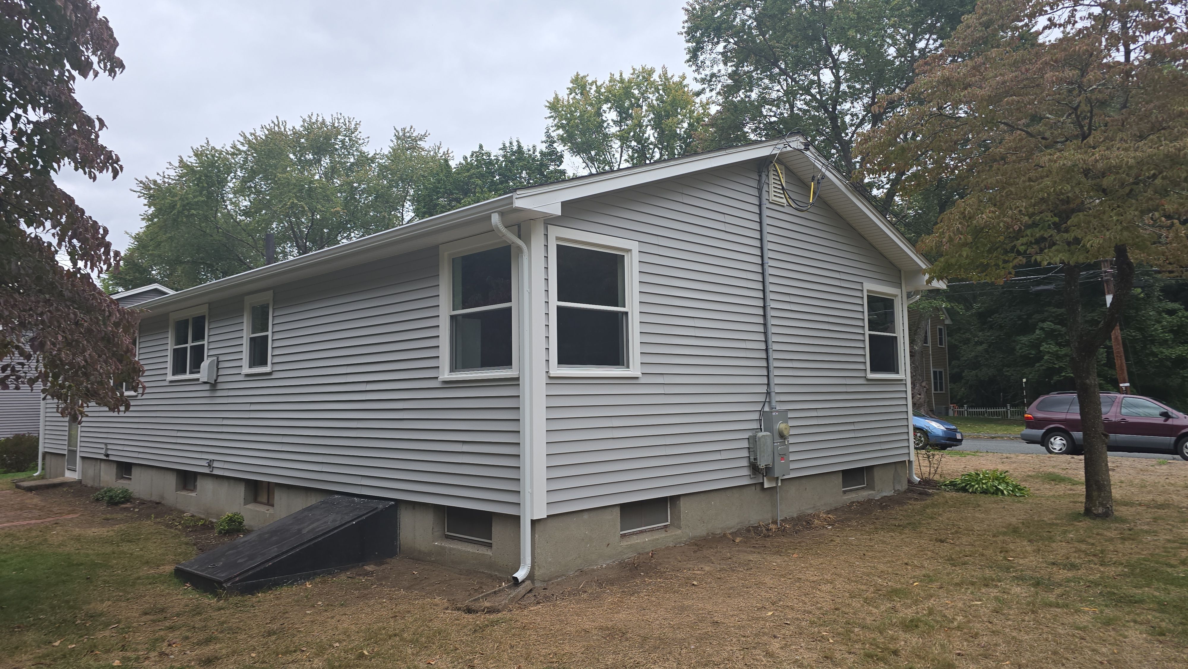 Complete exterior remodeling in NAtick, MA by UBrothers Construction