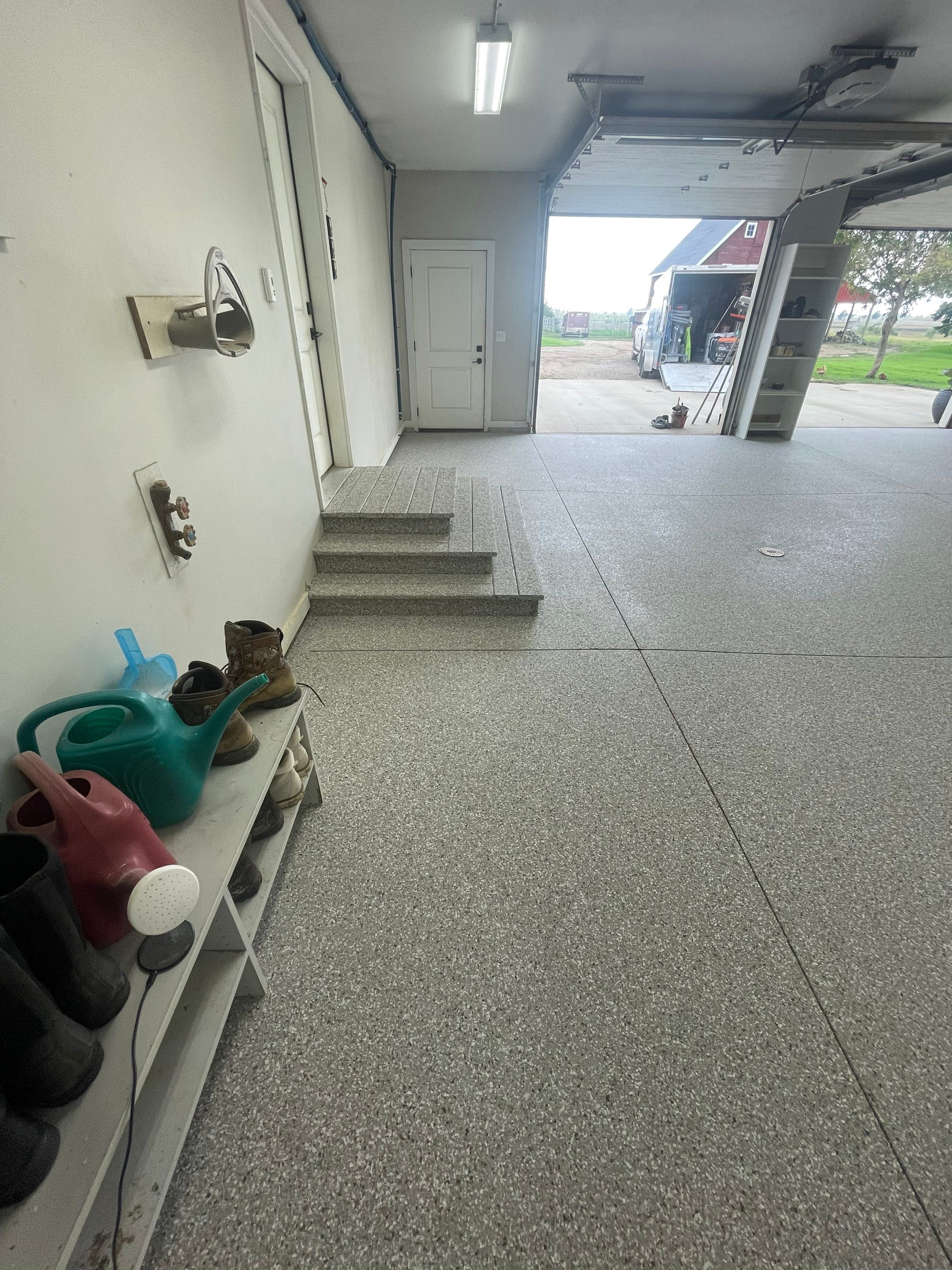 Grey Speckled Polyuera Garage Floor Coating for Hartford Three-Car Garage by Select Painting, Coatings & Garage Cabinets