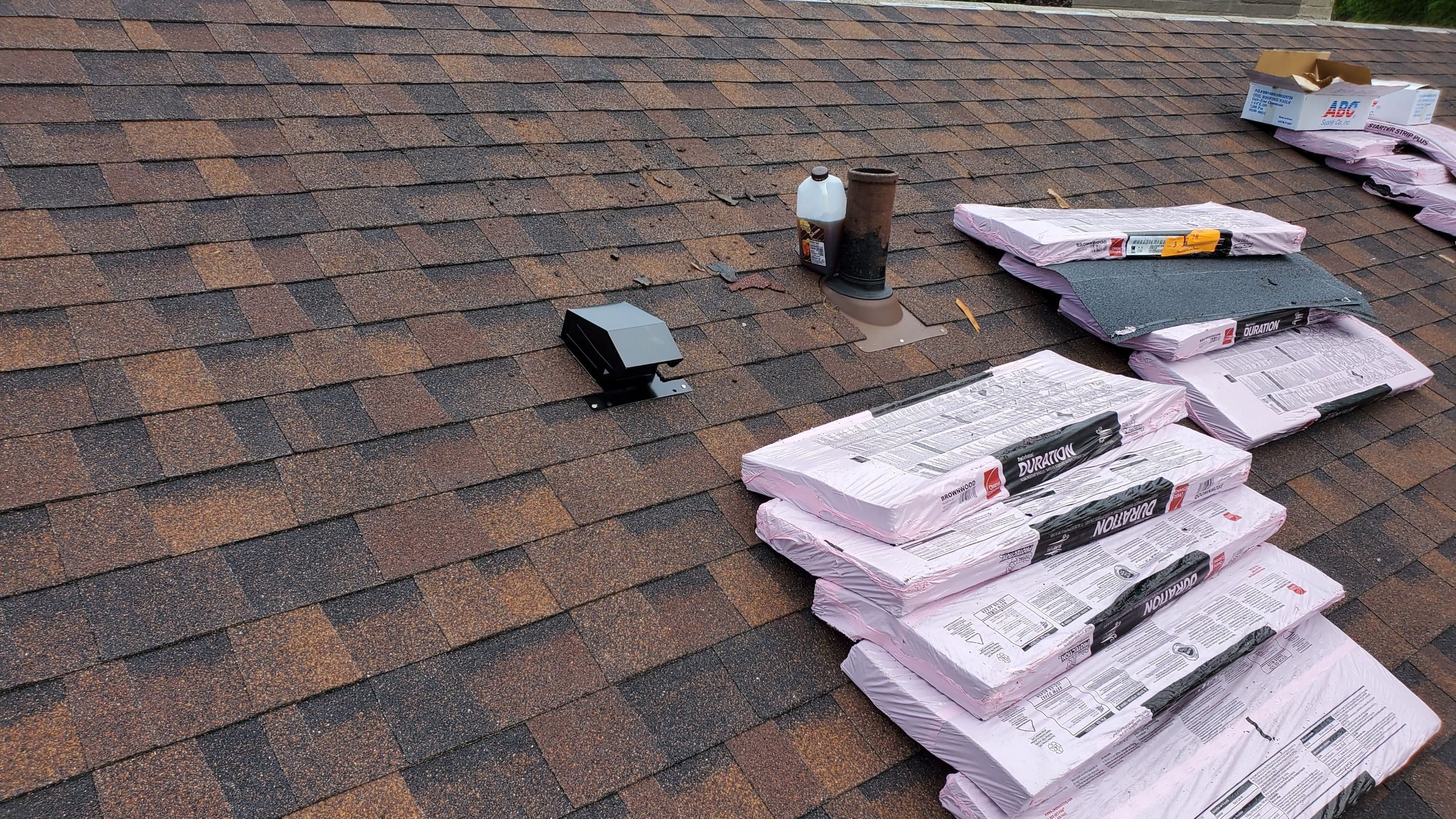 Residential Roofing Installation using Ownens Corning Duration Brownwood by Absolute Roofing and Construction