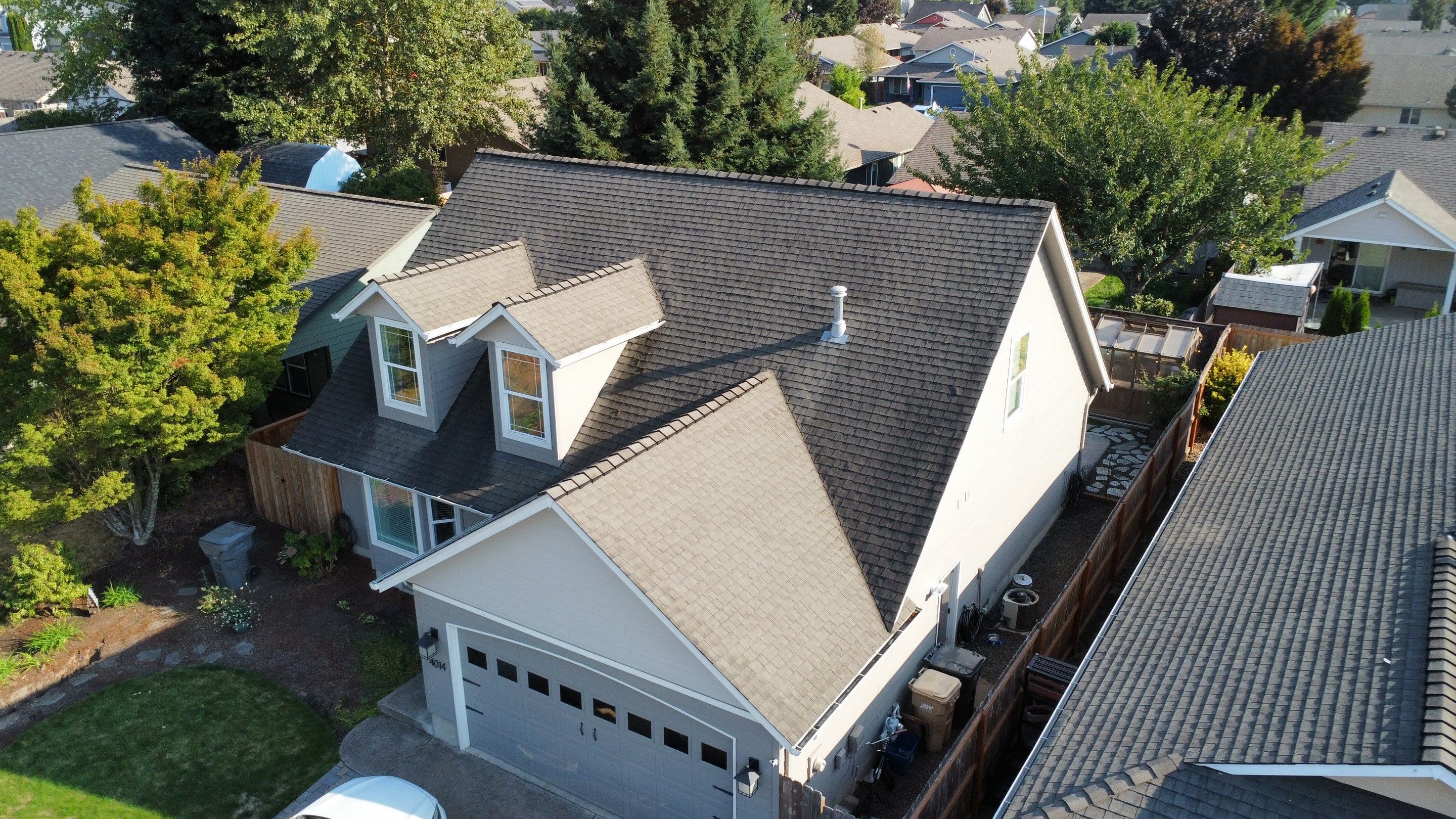 Granite Black Residential Roof Replacement by Orezona Building & Roofing Company, Inc.