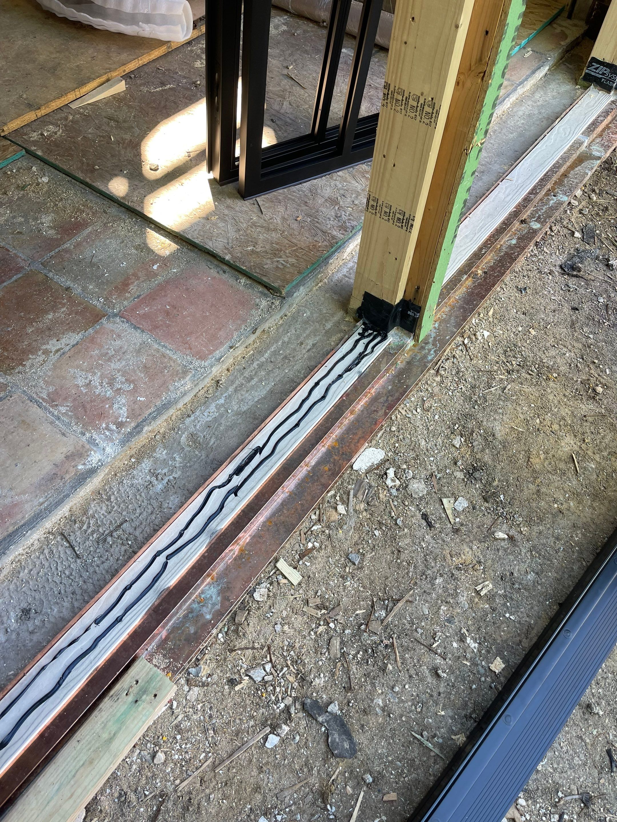 Arched Black Metal French Door Installation and Finishing in Fort Worth by Solara Custom Living