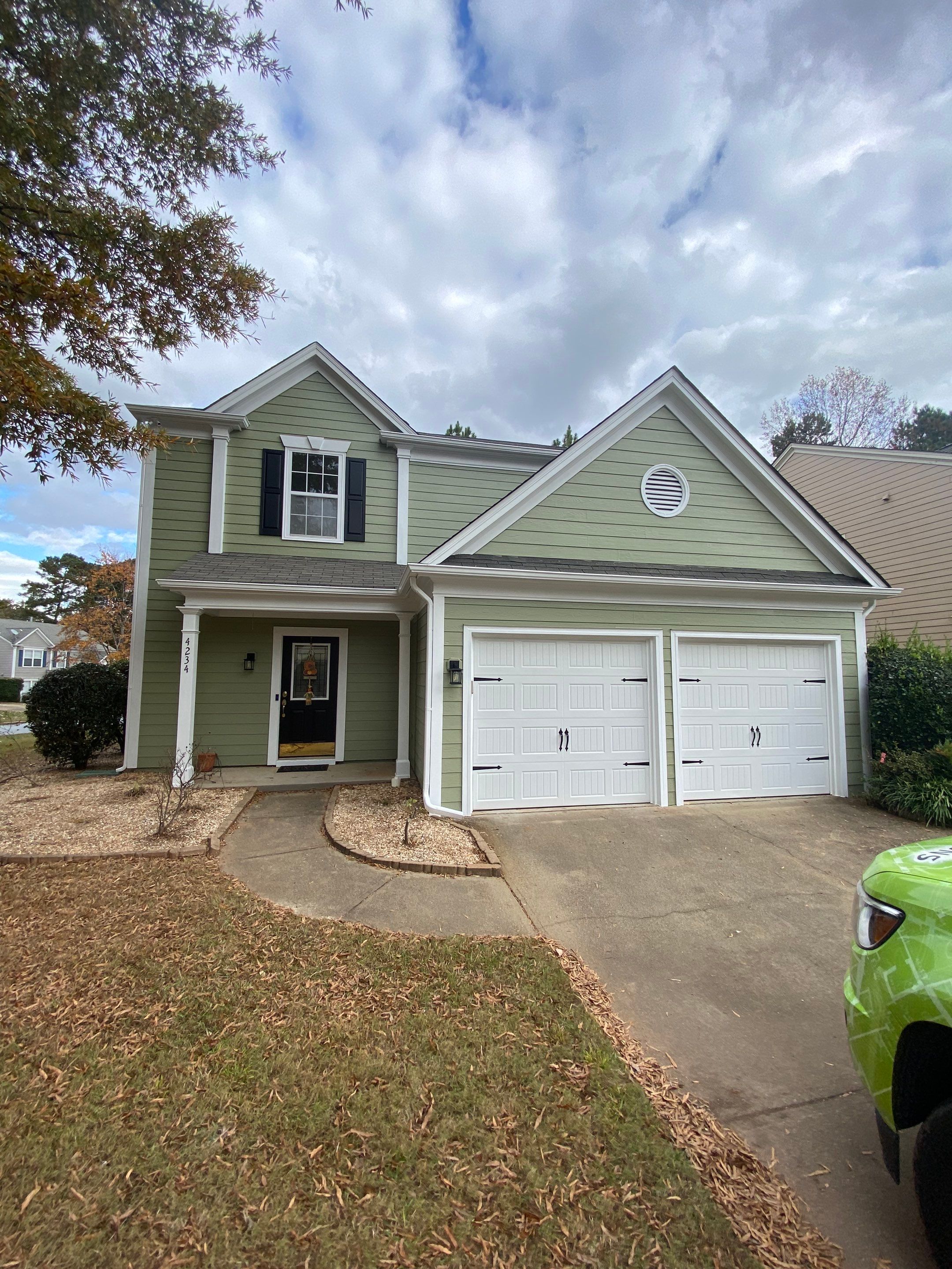 Exterior Painting for a Two-Story Sage Green Home in Kennesaw by Swift Home Renovations