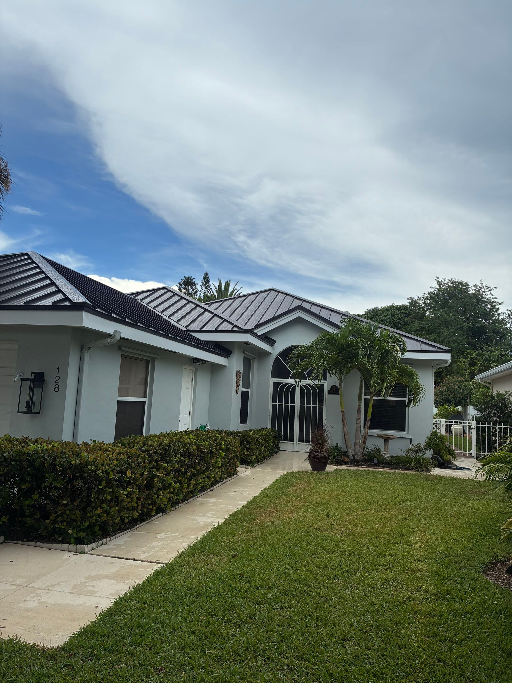24ga 1.5" Mechanical Seam Dark Bronze by Total Roofing System The Metal Roof Experts