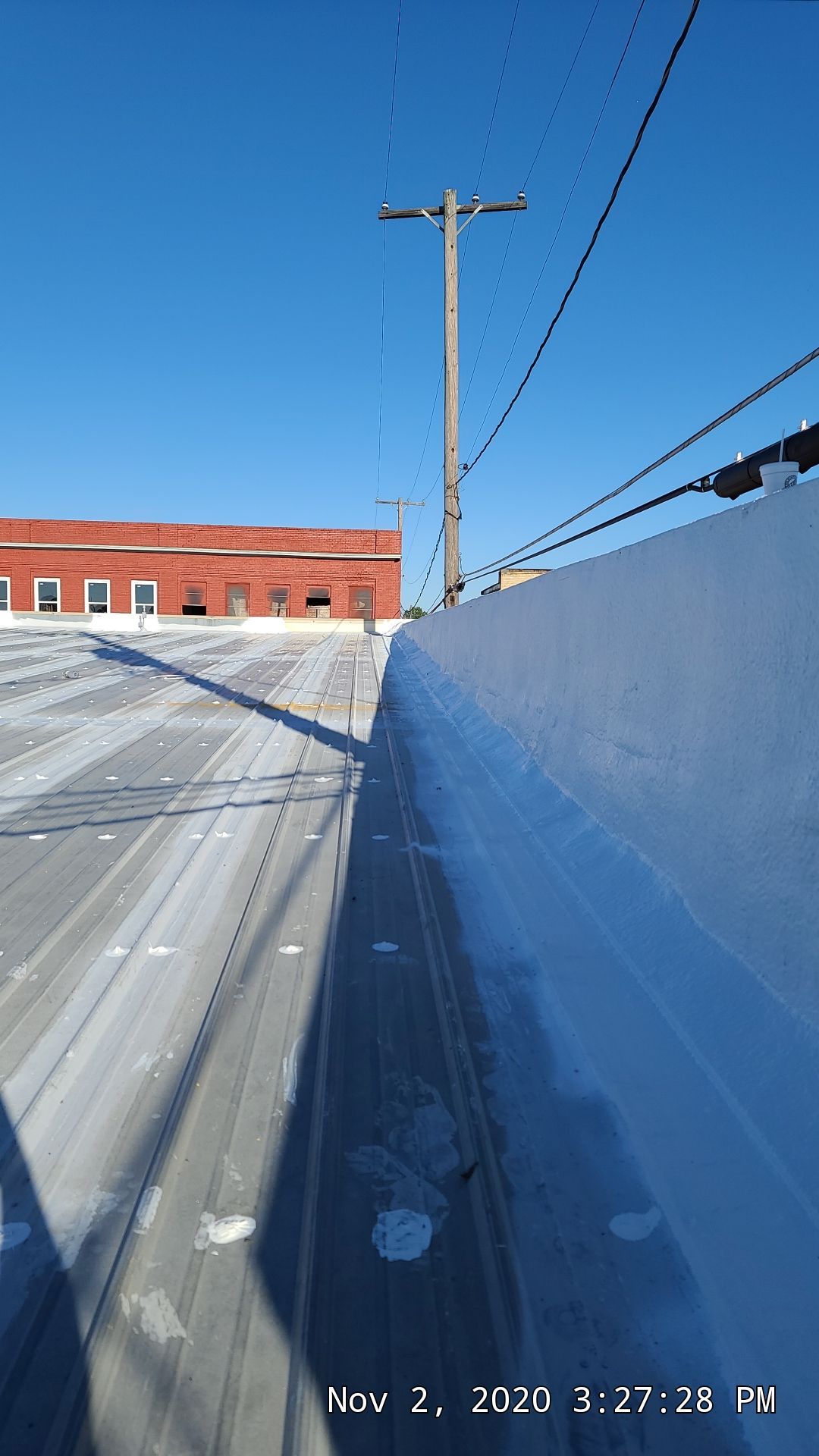 Commercial Metal Restoration System using Aldocoat Coatings by Hostetler Roofing