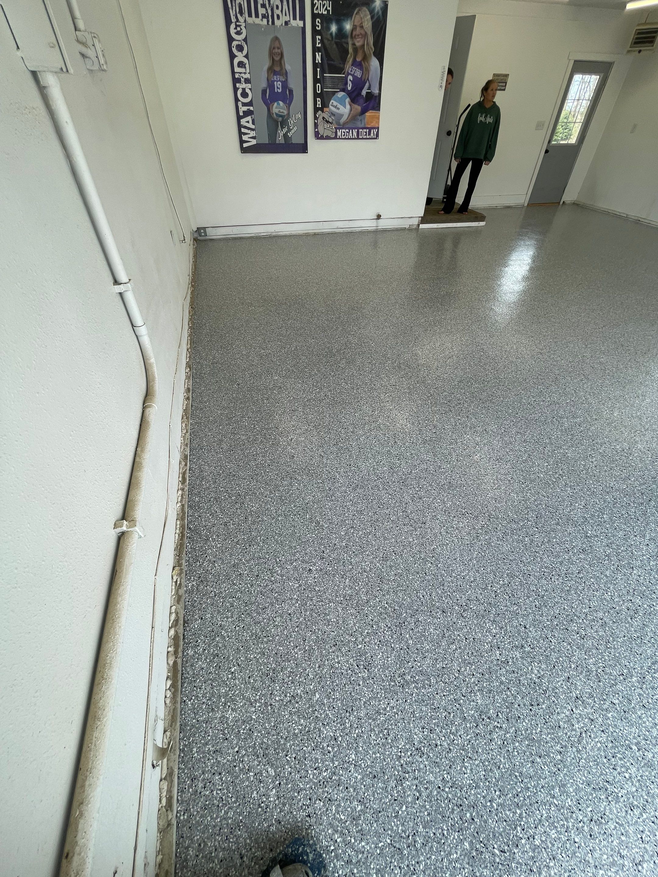 Feather Grey Garage Floor Coating and Crack Repair in Beresford by Select Painting, Coatings & Garage Cabinets