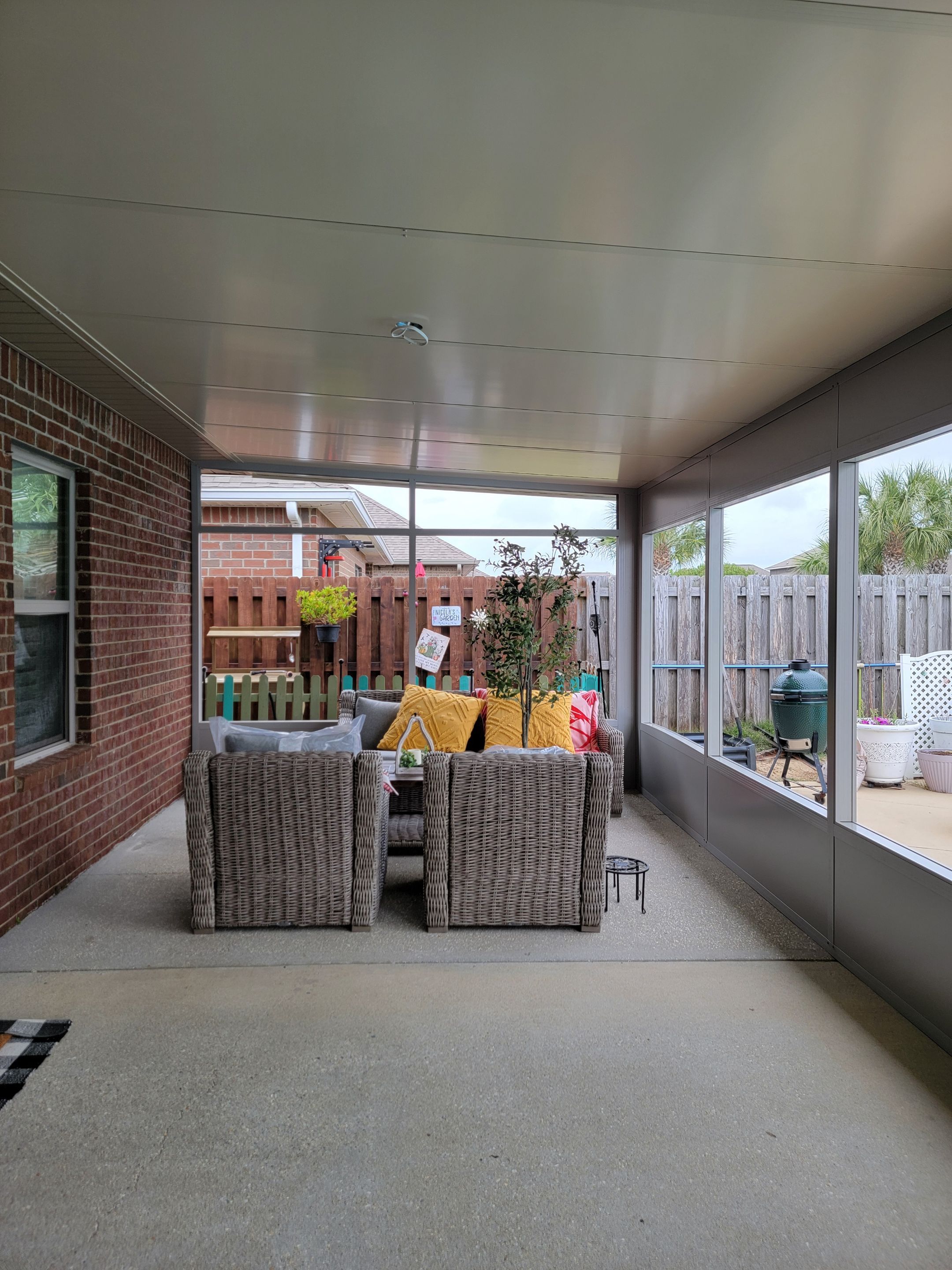 Poolside Screen Room & Patio Cover in Gulf Breeze by Titan Sunrooms