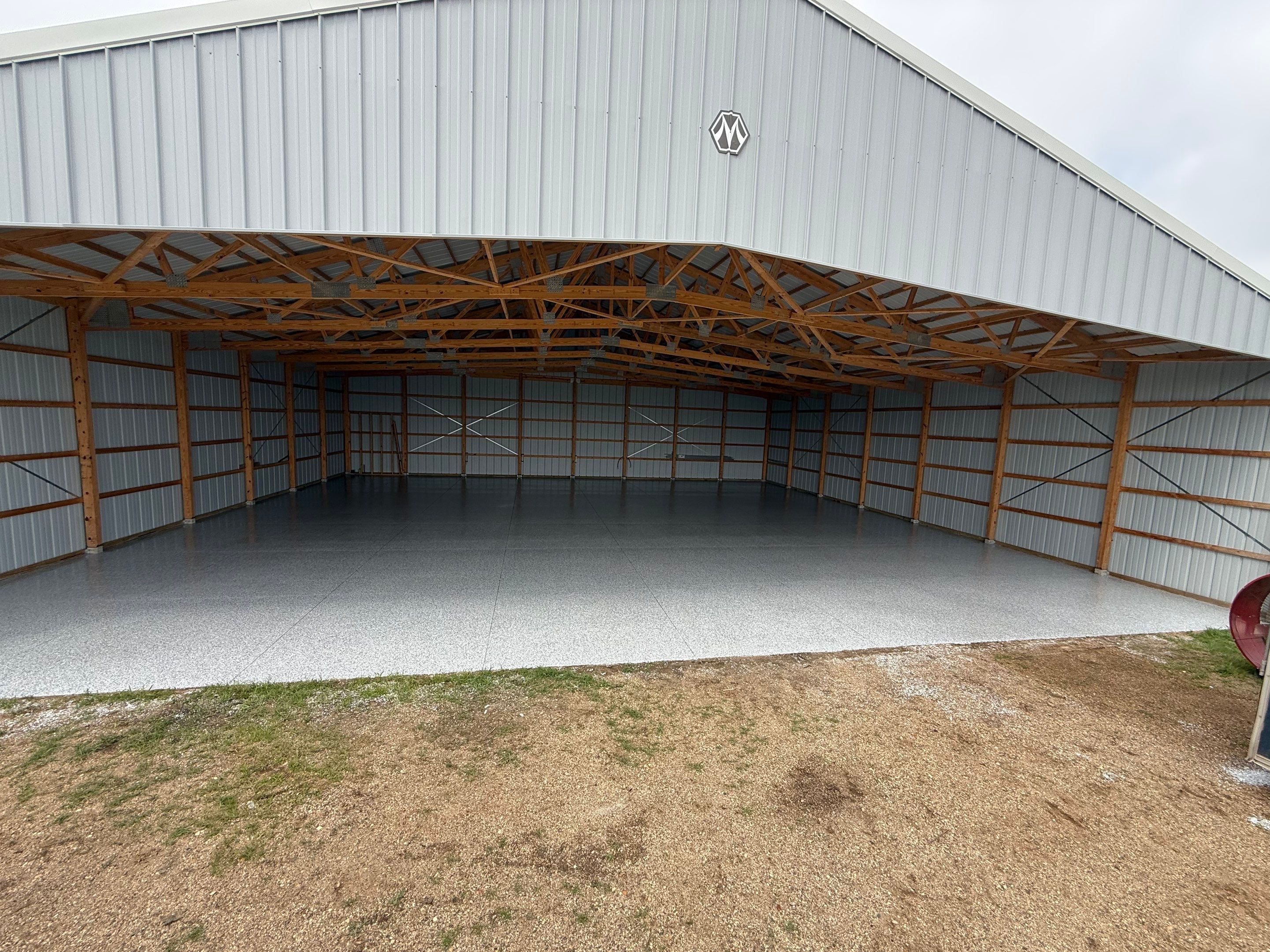 Durable Grey Speckled Epoxy Floor Coating for Yankton Shop by Select Painting, Coatings & Garage Cabinets
