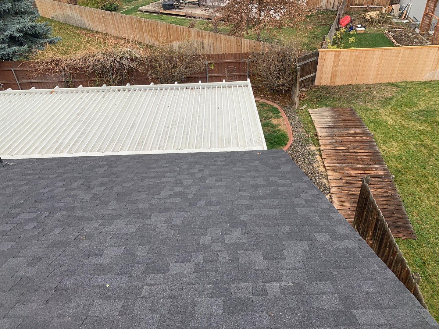Meridian residential roofing installation using Duration shingles in Teak color. by ID Roofing LLC