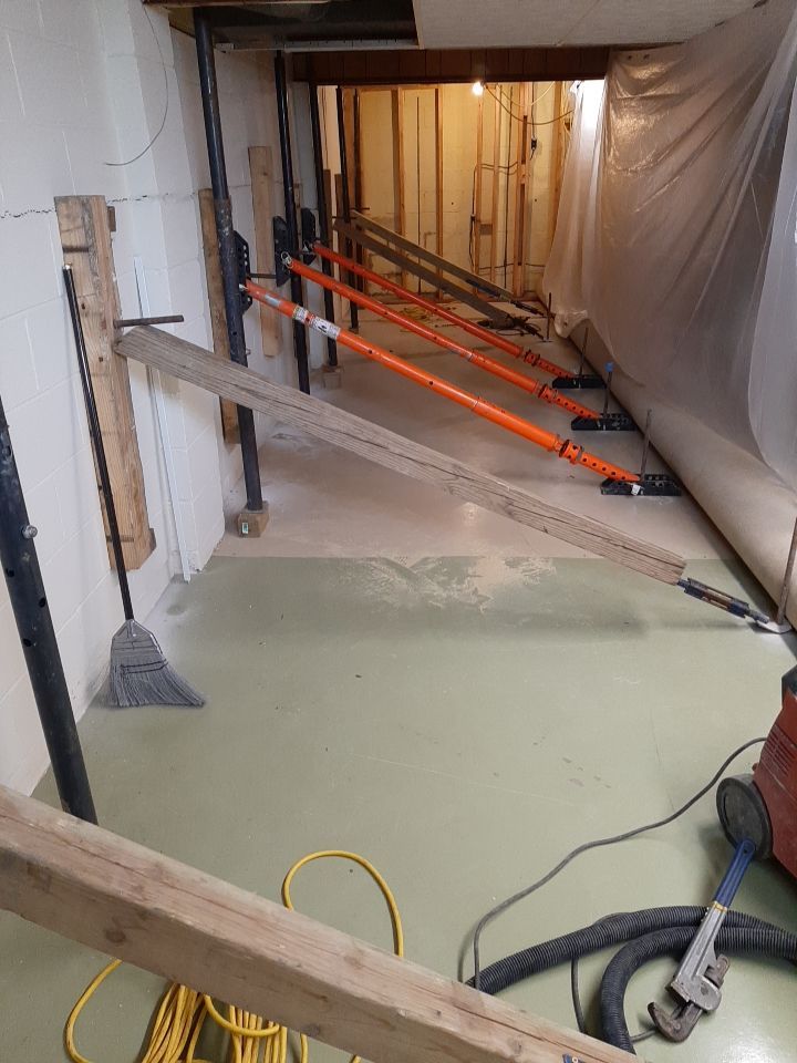 Wall Straightening and Reinforcement using Embedded Fiber Reinforcement by Toledo Basement Repair 