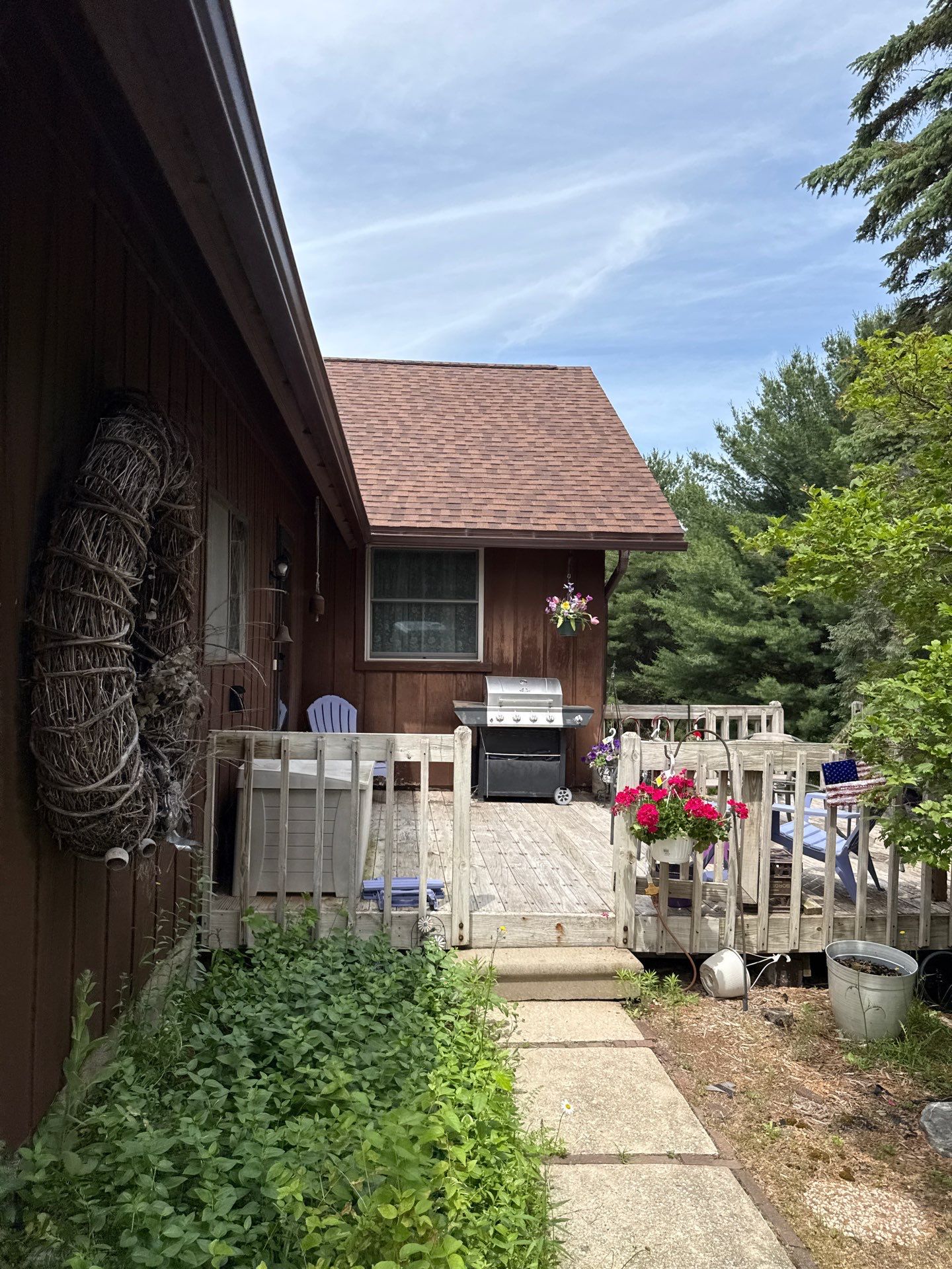New Gutter and Downspout Installation for Bellaire Residence by Rainbow Seamless Systems