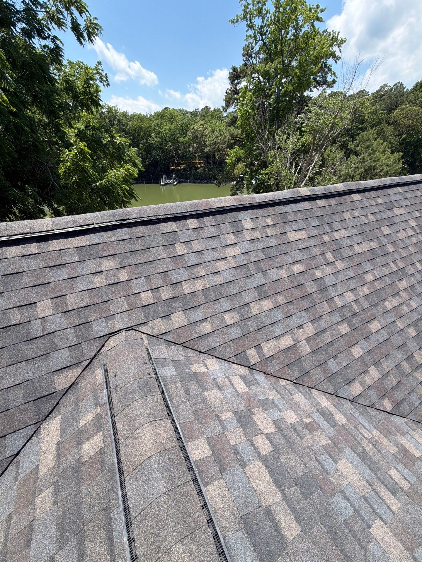 Complete Asphalt Shingle Roof Replacement and Sheathing Repair in Deltaville by Cade Construction