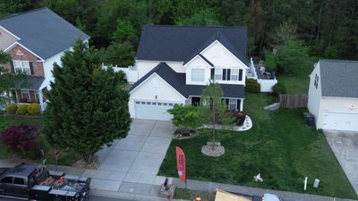 Roof and gutter replacement by hail damage