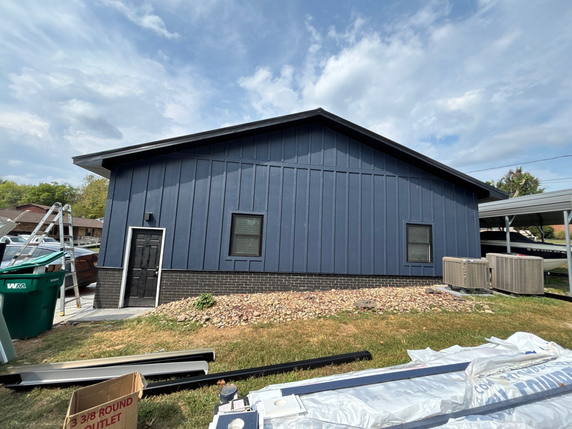 Siding and Metal Roof by Fahey Roofing + Contracting