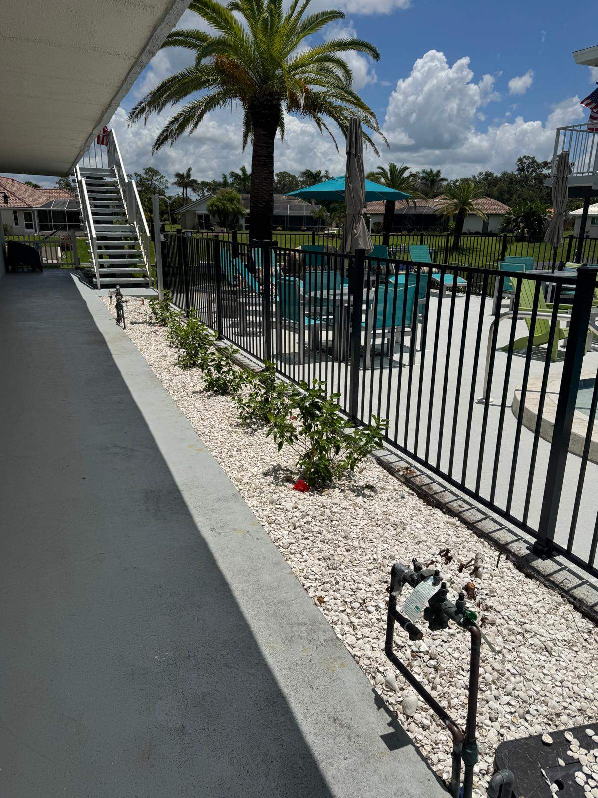 Black Aluminum Pool Fence Replacement in Englewood by True Fence LLC