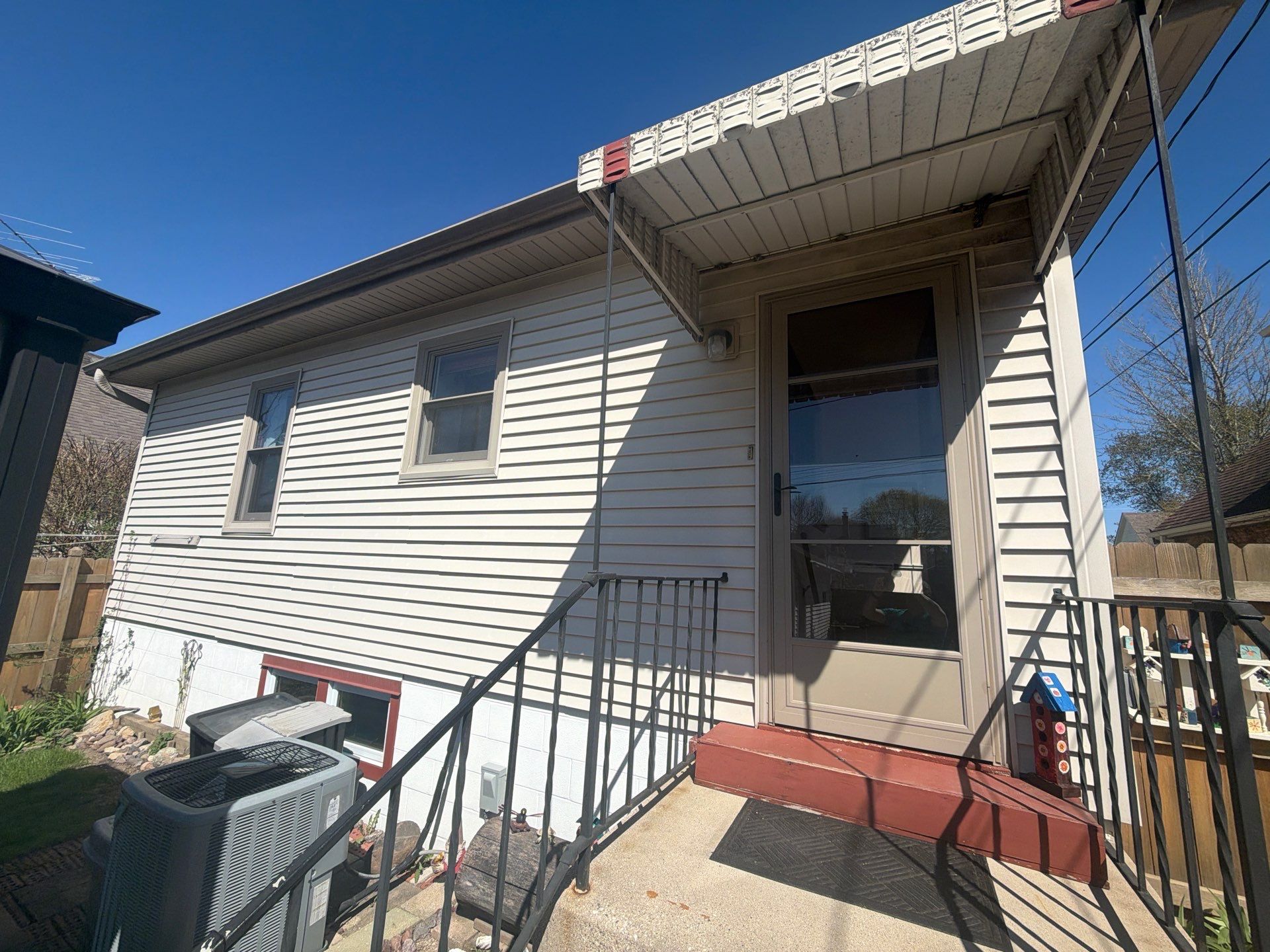 New Wooden Deck and Front Entry Stair Installation in Milwaukee by OCS Contracting Services