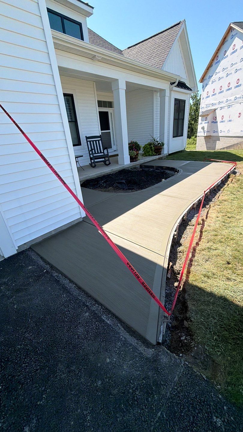 Pittsford Broom Finished Walkway by NG Masonry & Construction LLC