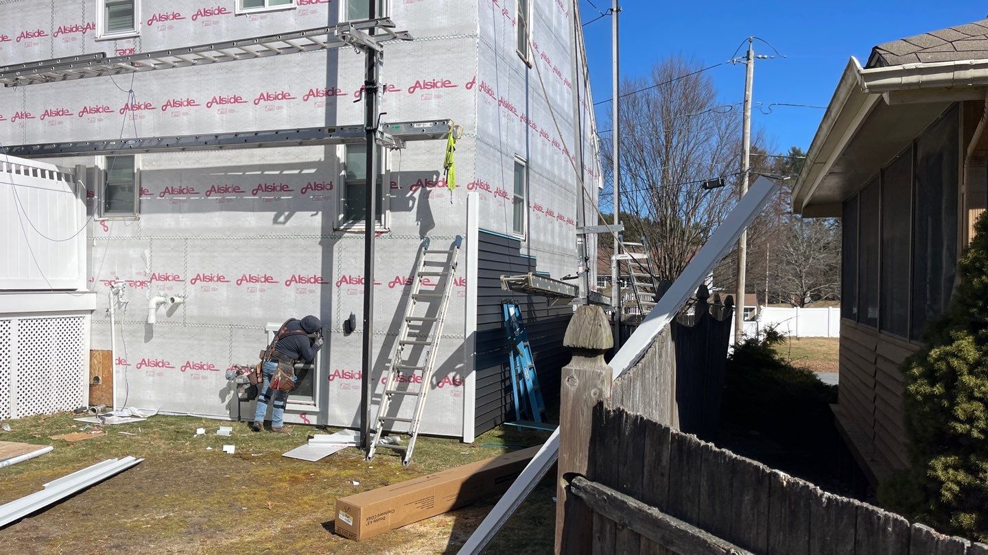 Complete Exterior Renovation with New Siding & Gutters   by Sensible Home Solutions