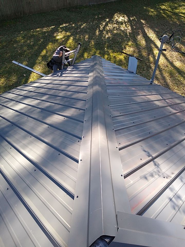 Residential Roofing Installation using Roof Replacement by American Roofing & Construction LLC