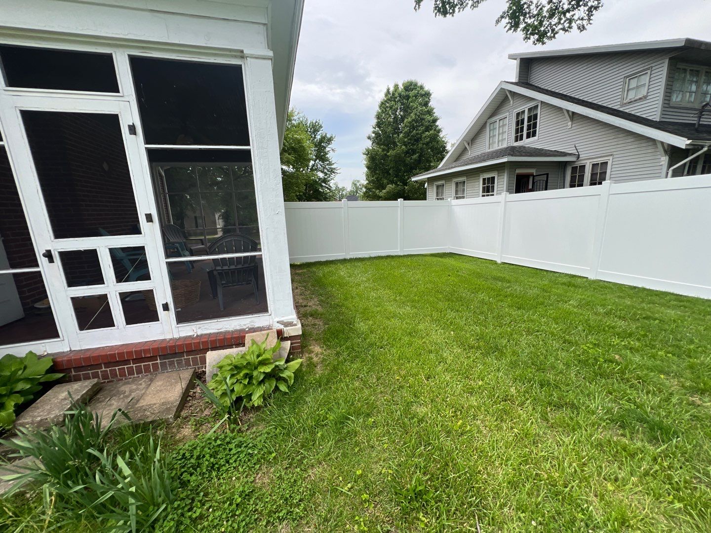 Privacy white vinyl fence by Mr. Fence