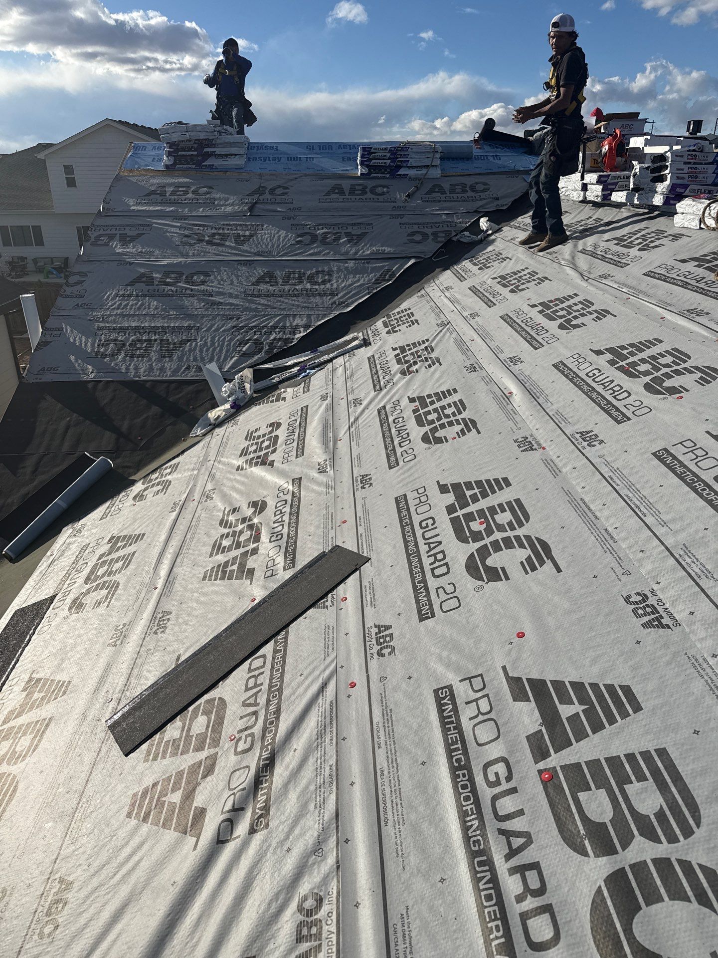 Re-Roofing & New Gutters  by RTP Roofing Company